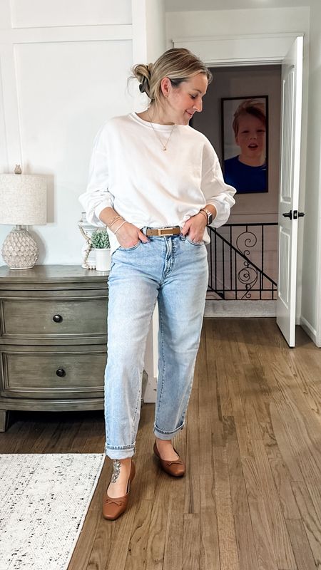 A spring outfit. Small sweatshirt. It’s thin terry and so comfy but perfect for warmer weather. Tts jeans. I love these! Can be cuffed or worn regular. True to size ballet flats that are so comfortable and the perfect color to go with everything! 

#LTKfindsunder50 #LTKstyletip #LTKMostLoved