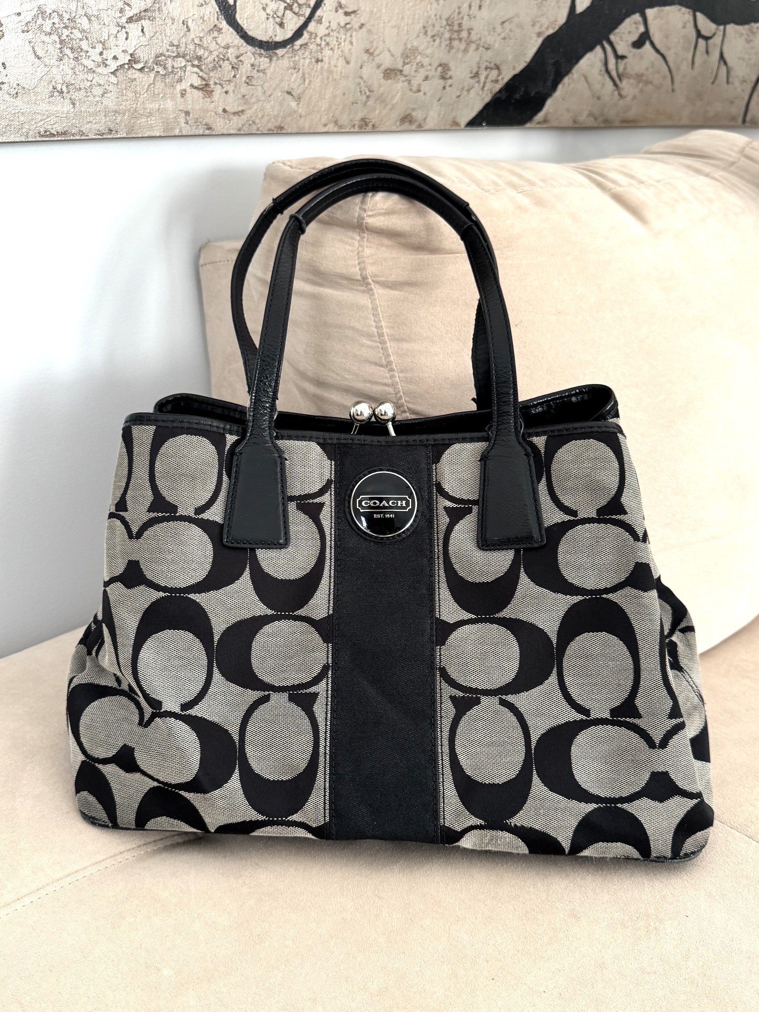 She’s a classic for a reason. I love this vintage Coach bag and I always get stopped and asked about it. The iconic signature print, structured silhouette, and timeless black + neutral combo make it one of those forever pieces that never goes out of style. It fits all the daily essentials while still looking polished and elevated—perfect for errands, brunch, or dressed-up casual days. I found a few similar vintage Coach bags for sale and linked them here so you can snag one before they’re gone. Vintage Coach is having a serious moment, and once you own one, you’ll get the hype.

vintage coach bag • coach signature handbag • vintage designer purse • coach canvas tote • classic coach handbag • everyday neutral purse • secondhand designer bag • vintage coach purse • timeless handbag style • coach black and tan bag

#LTKstyle #VintageCoach #DesignerOnABudget #ClassicStyle #TimelessFashion #CoachBag #EverydayBag #NeutralStyle #VintageFinds #HandbagGoals 

#LTKSaleAlert #LTKValentine #LTKootd