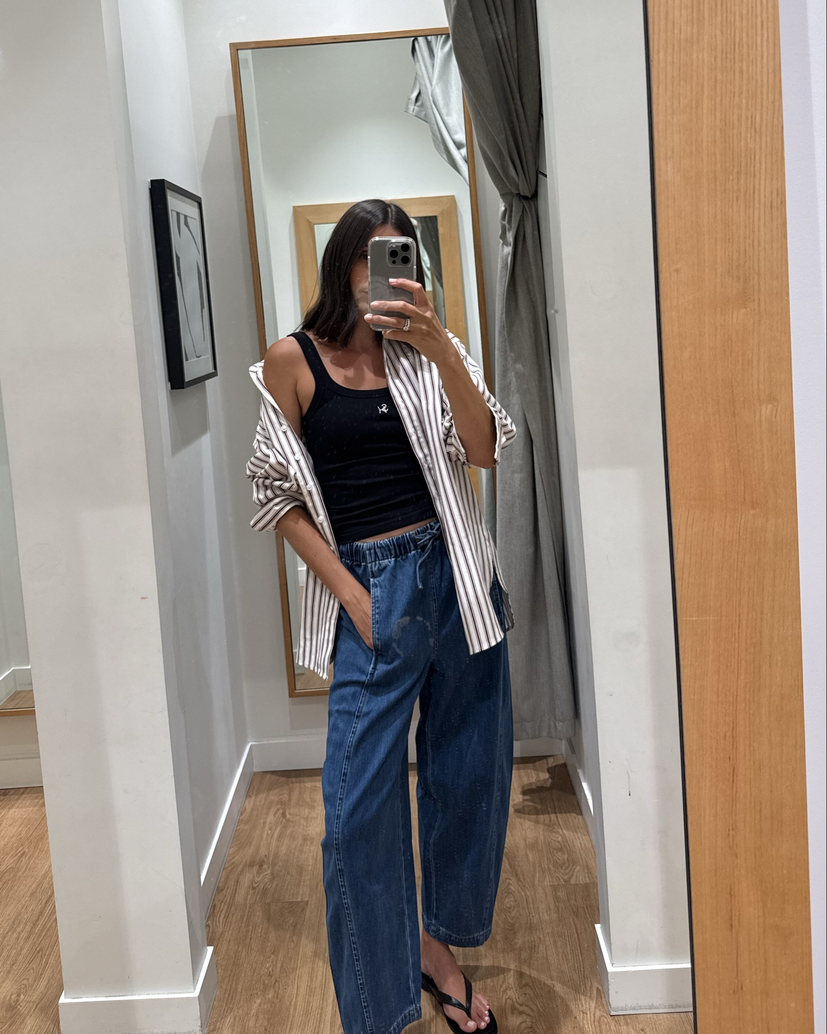 Comfy barrel leg jeans with an elastic waist styled with a black tank and oversized shirt x 