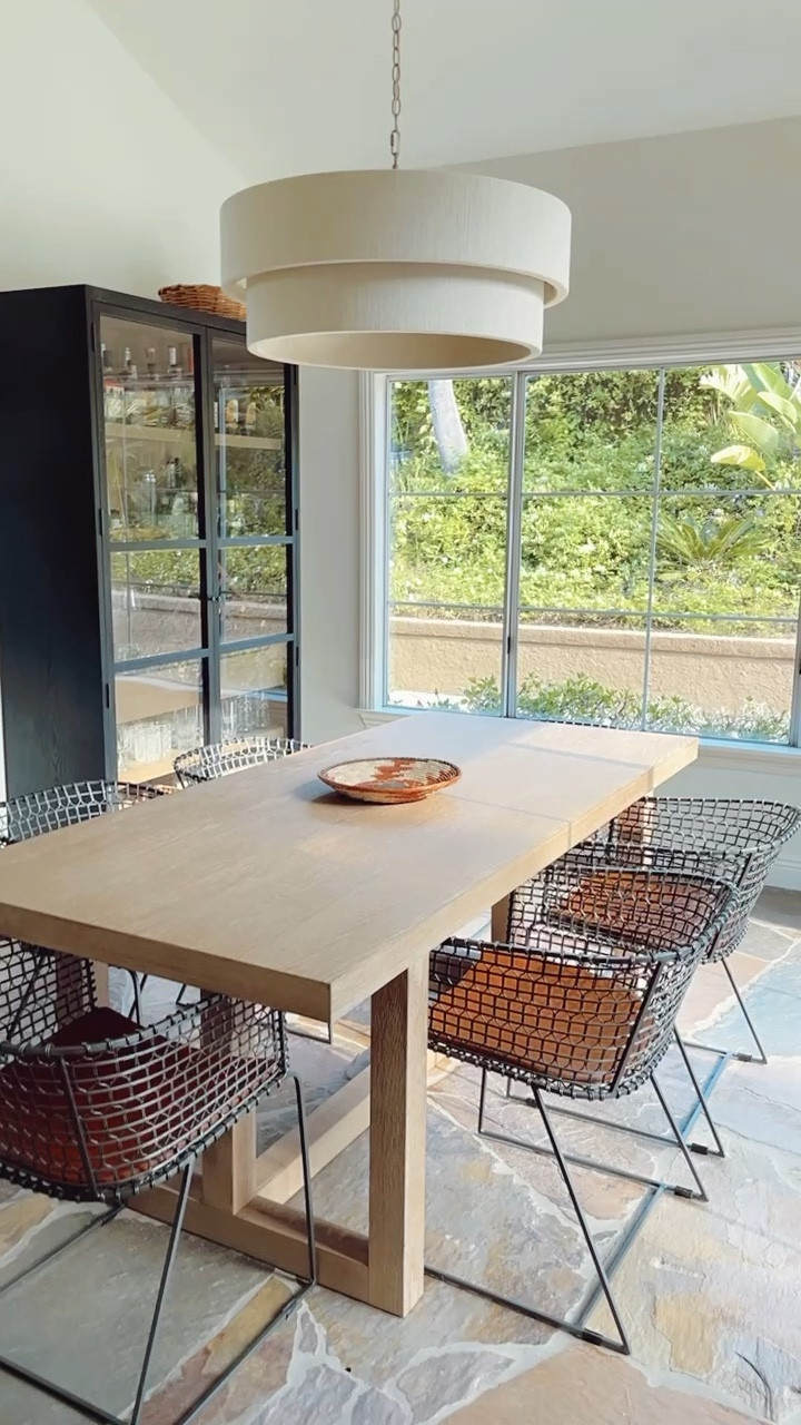 Absolutely loving our new dining room pendant! It’s the Delaney Drum Pendant by Capitol lighting and you can find it at Lumens. It comes in two sizes. This is the large. #lighting #pendant #diningroom #diningtable 