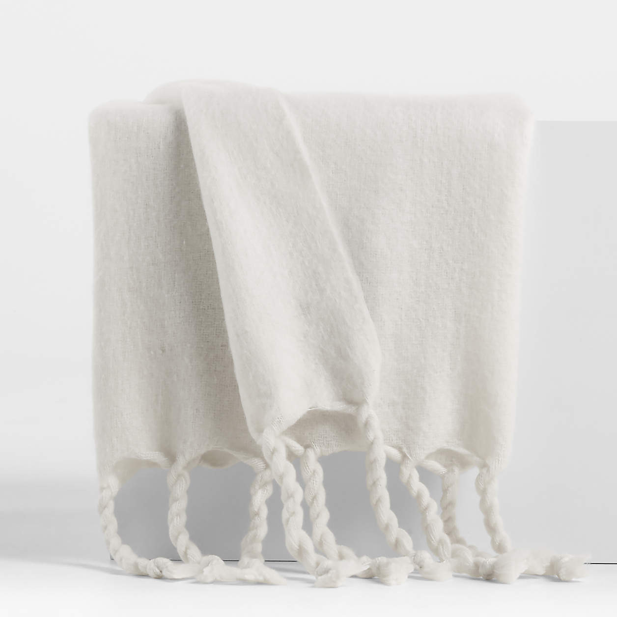 Cozy Fringe 70"x55" Arctic Ivory Throw Blanket + Reviews | Crate & Barrel | Crate & Barrel
