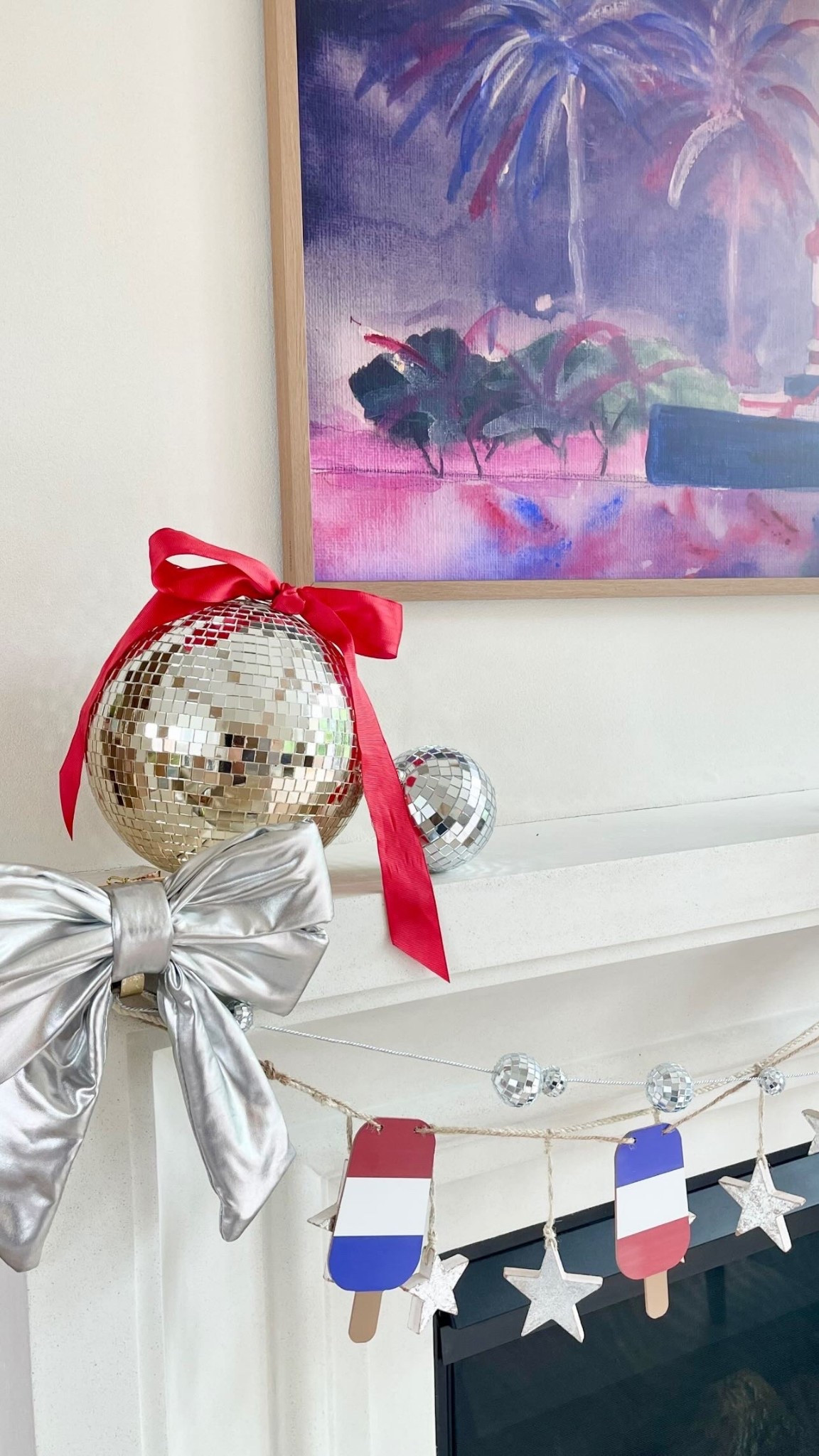 4th of July Disco ball and bows decor! 

#LTKHome #LTKSeasonal