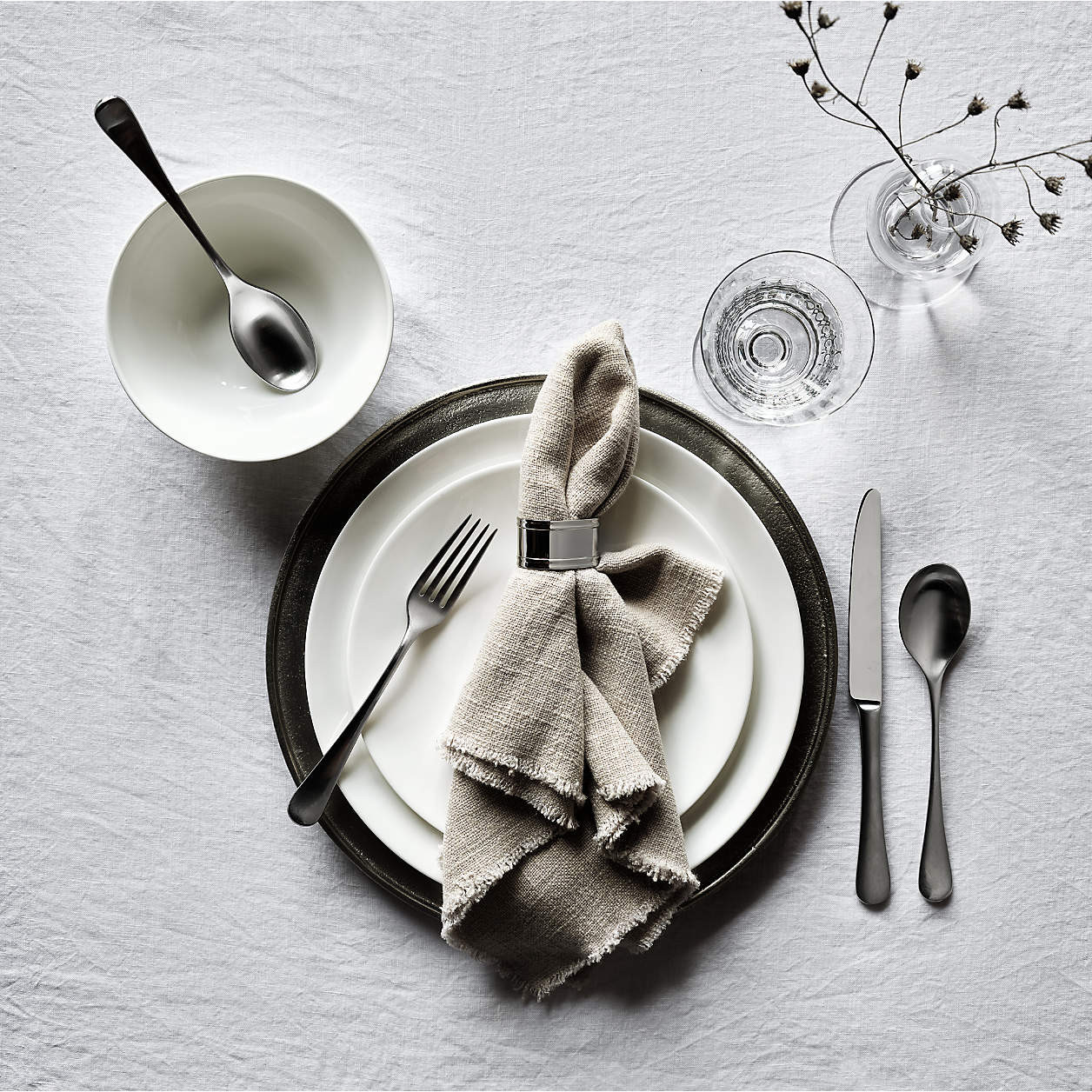 Argento Antique Metal Charger Plate | Crate & Barrel | Crate & Barrel