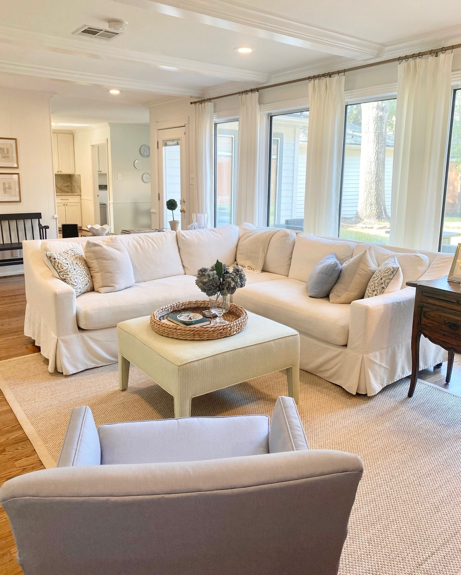 I am seeing lots of questions about my family room sectional! I have linked it below as well as some similar looking sectionals at a variety of sizes/prices/styles! The sectional I have is in the fabric, Performance Everydaylinen by Crypton Home, Ivory. The sectional I have is slipcovered, which I love. I also have the bench seating, which I have liked! I take it to be dry cleaned once/twice a year. I am able to clean mud/dirt etc off the couch that my dog gets on it (which happens often haha) by spot cleaning it which has worked well! I think the performance fabric has helped with making it easier to maintain/clean! It is a down-blend cushions, which I don’t always love because feathers sometime poke out/come out, but it is very comfortable! The only real issue we have had with it is the connecting piece keeps getting disconnected and we are thinking it might be broken and are trying to see if we can get it fixed!

#LTKhome