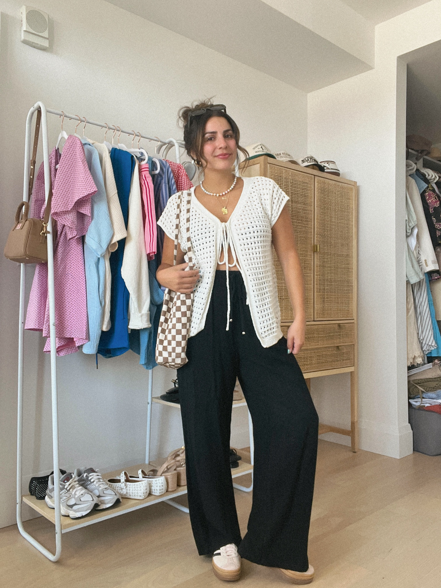 Just got this sweater vest top and i'm in LOVE. Fits so oversized & cute! Paired it with my go-to wide leg pants (I have 3 colors of these) and a little tank underneath. All true to size, M. Top could be dressed up or down but love how it makes the outfit more fun!

#LTKStyleTip #LTKSaleAlert #LTKFindsUnder50