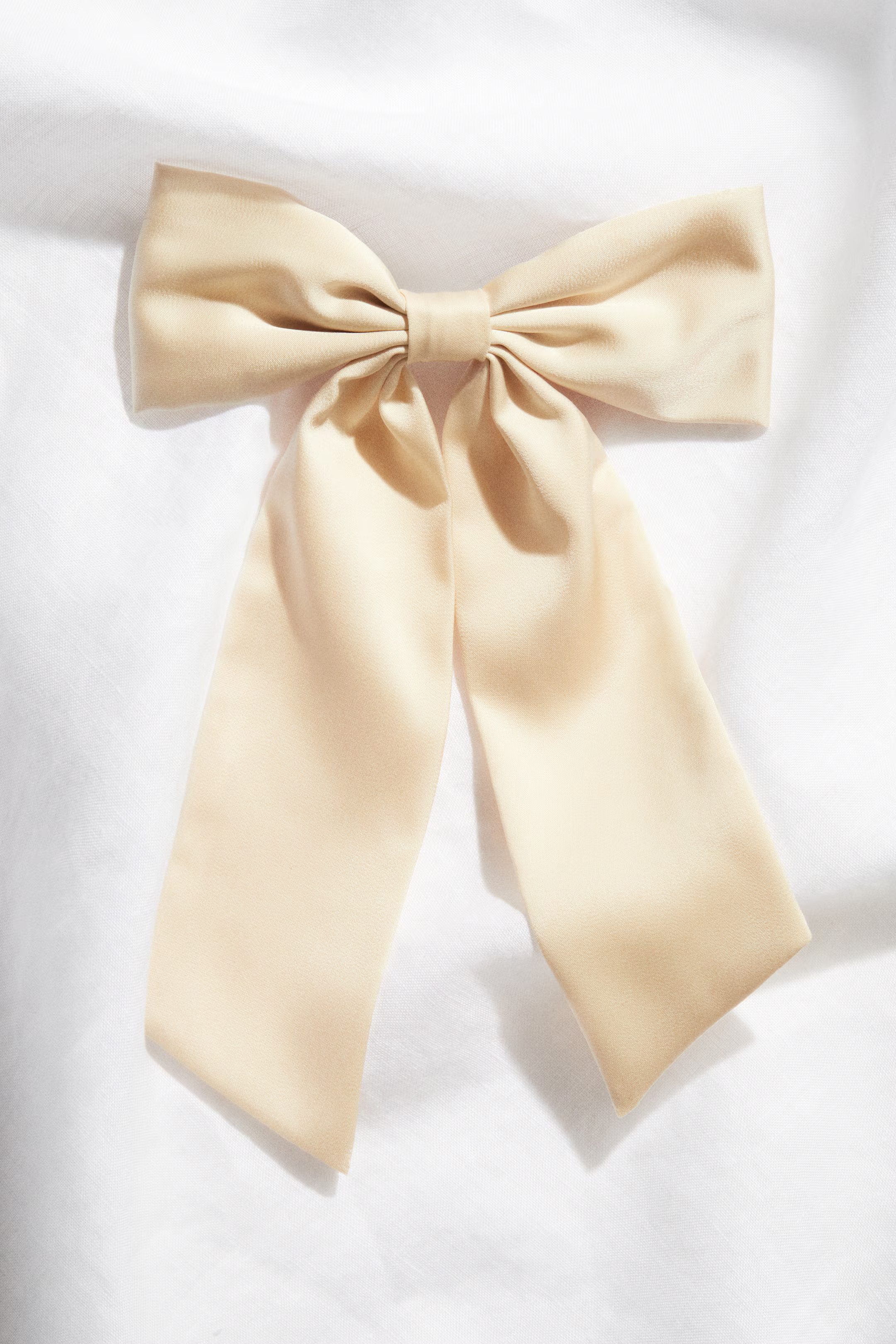 Bow-decorated hair clip | H&M (UK, MY, IN, SG, PH, TW, HK)