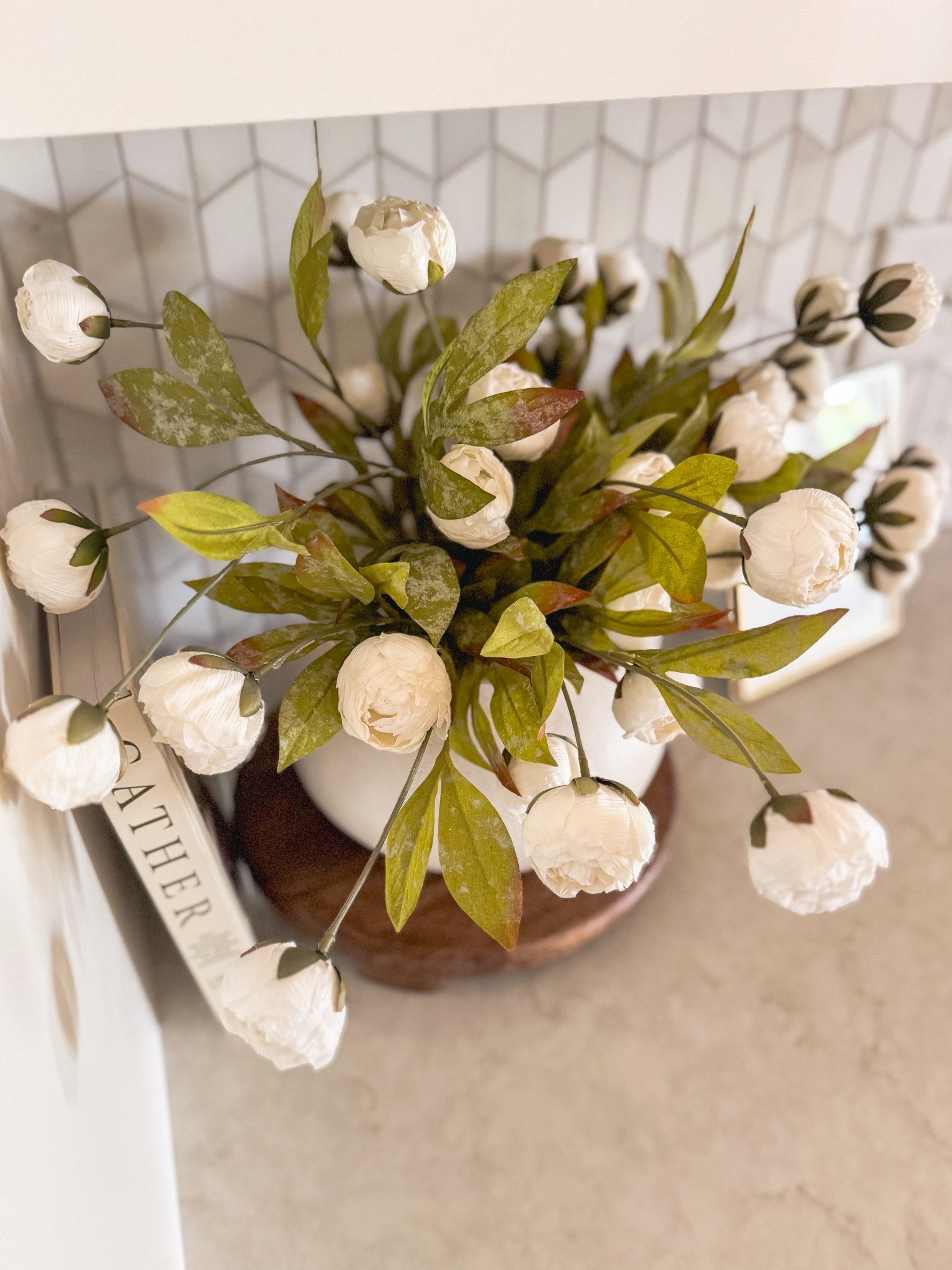 A little greenery goes a long way…
Whether it’s a potted herb in the kitchen, a trailing vine on open shelves, or a bundle of realistic faux stems like these—plants instantly bring life, texture, and warmth to any space.

This is one of my favorite ways to soften a white kitchen and make it feel more lived in and layered.

#homedecor #kitchendecor #fauxplants #stylingtips #neutraldecor #modernorganic #kitchenvibes #decorinspo #housemademoore

#LTKHome #LTKFindsUnder50 #LTKWatchNow