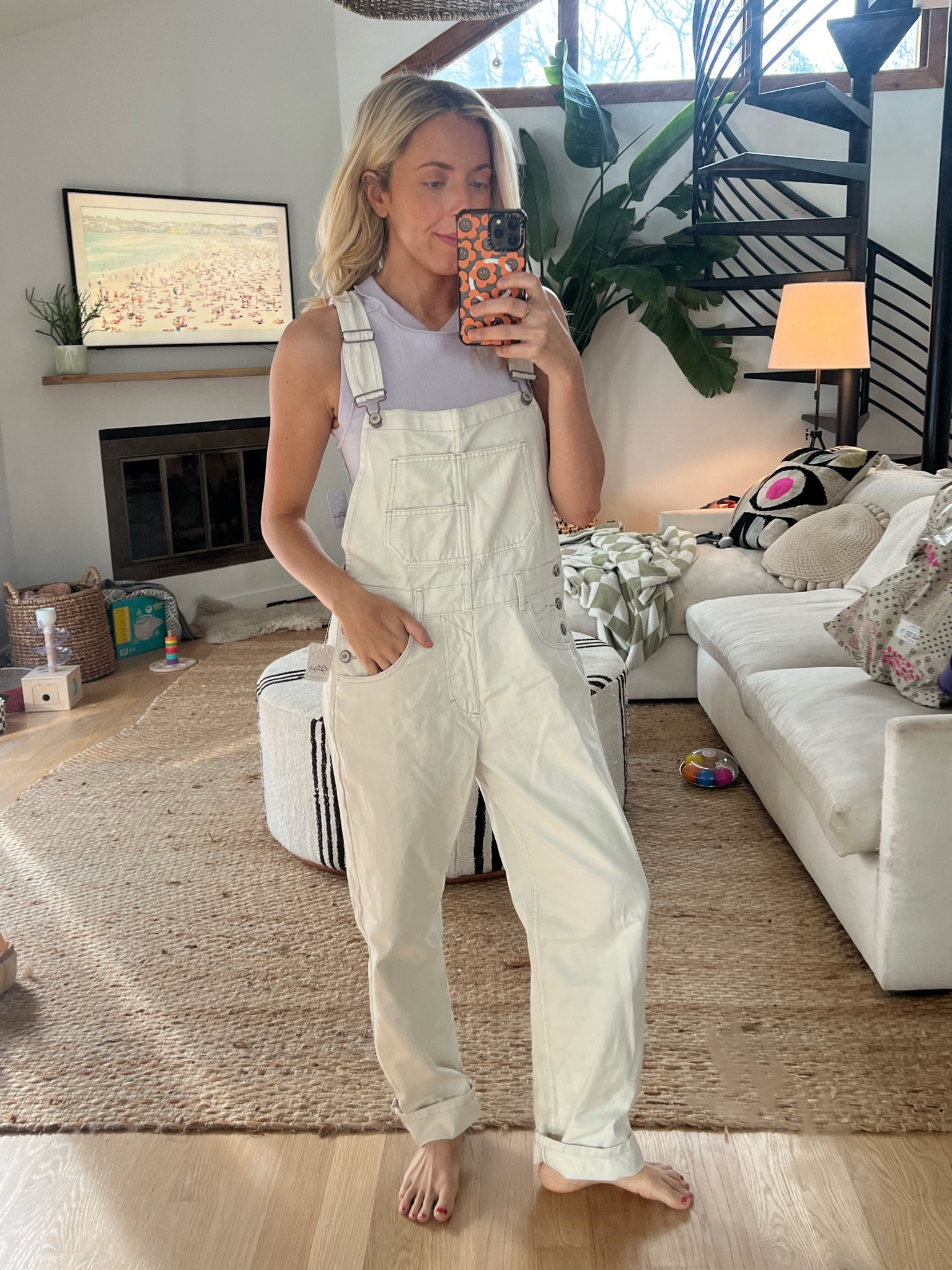 Size small in overalls 
Size small in tank 