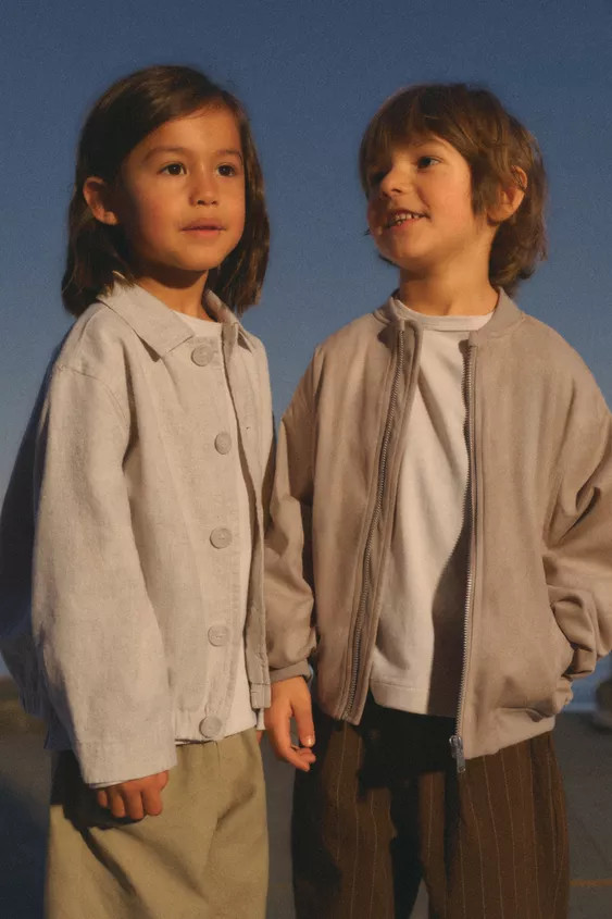 Jacket with a shirt collar and long sleeves. Elasticized hem. Front button closure. Front pockets... | Zara US