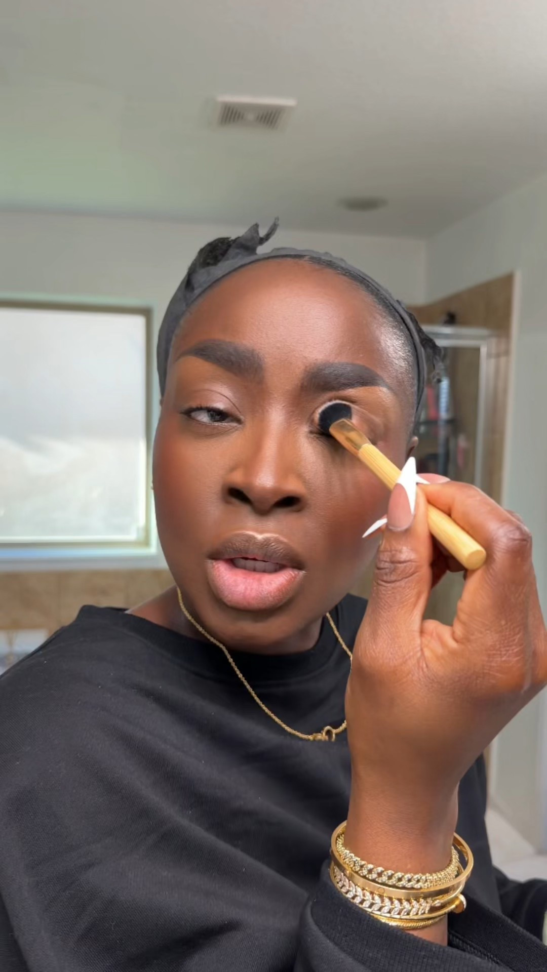 Using the FENTY foundation brush to apply leftover contour product in this area to ensure that there are no harsh lines. 

#LTKBeauty