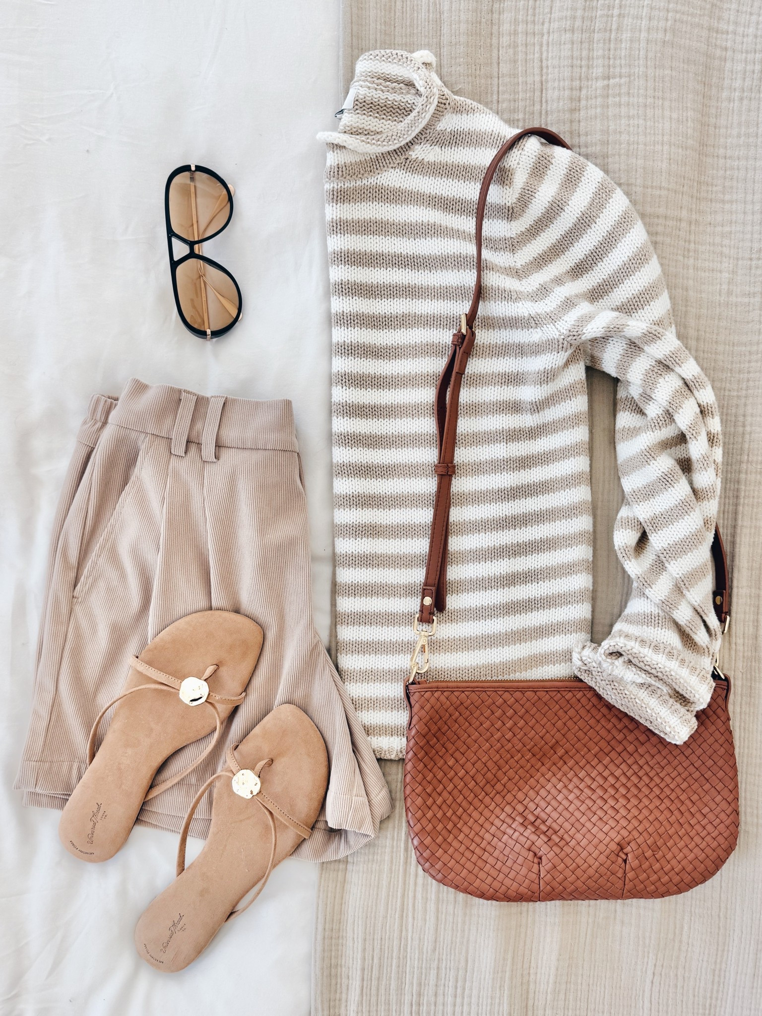 Spring outfit.  Small shorts and sweater.  Sunglasses.  Sandals true to size  

#LTKgrwm #LTKOver40 #LTKmomlife