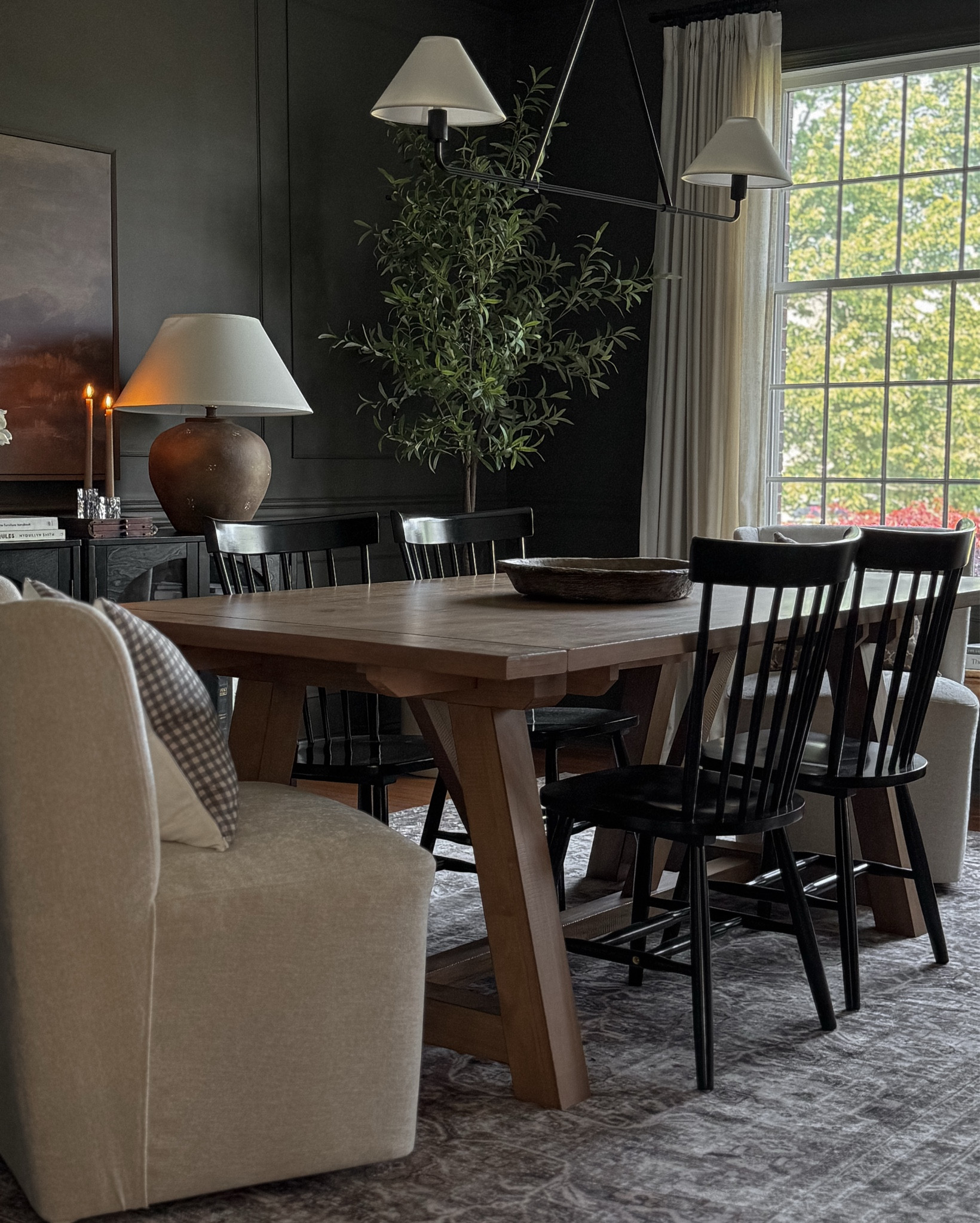 Wall color: Muddled Basil by Sherwin Williams

Moody dining room, dark green dining room, dining table, dining chairs, accent dining chair, dining room lamp, dining room rug, Amazon curtains, sideboard decor

#LTKHome