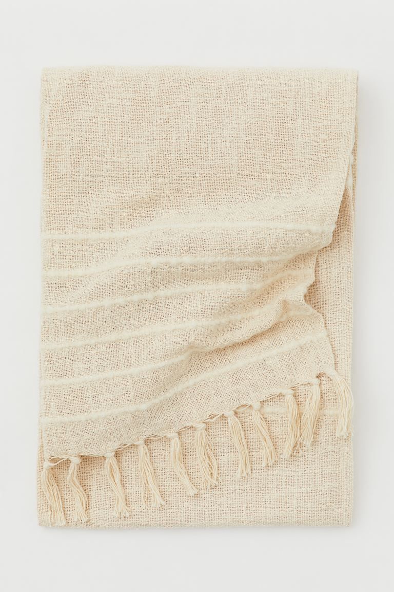 Throw in airy, woven fabric made from an unbleached cotton blend with wool content. Thicker, tone... | H&M (US + CA)