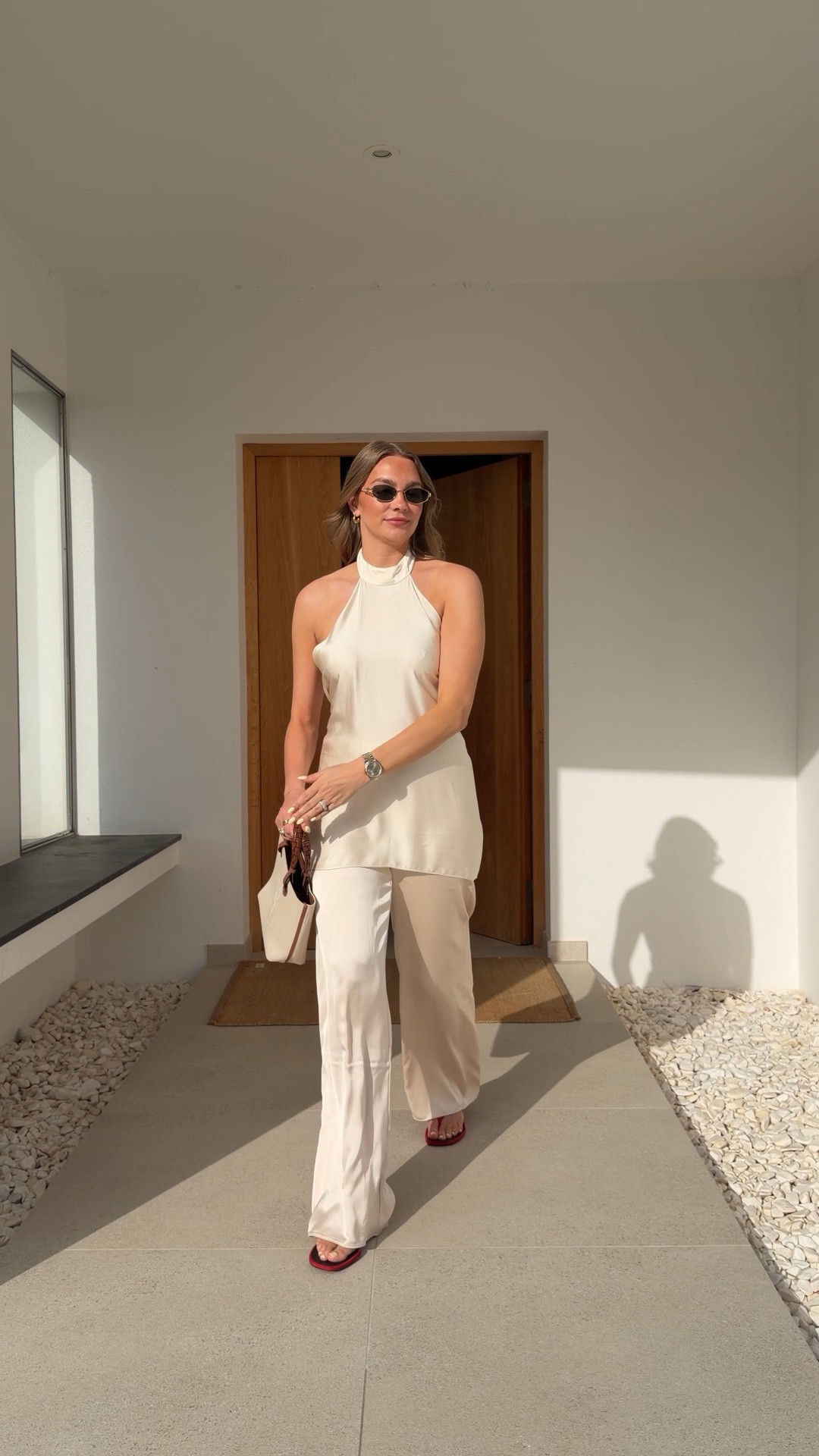 Cream holiday outfit 
H&M backless satin top 
Mango satin trousers
Massimo red heeled sandals 