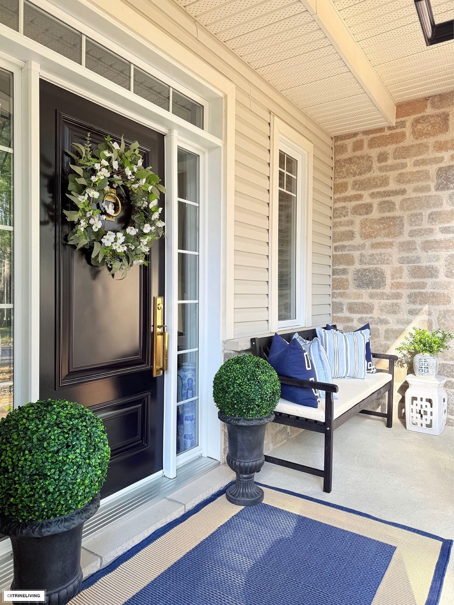 Front porch refresh with classic urns, boxwood topiaries, outdoor bench, chic pillows, lush wreath and more!

Chic home, chic decor, spring finds, spring decor, summer finds, summer decor, front door decor, outdoor decor 

#LTKHome #LTKSeasonal