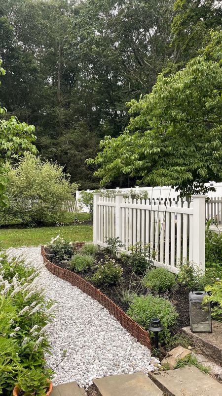 Can’t get over this transformation in the backyard! And I did it all myself. 💪🏻 

Wayfair woven willow fencing and solar landscape pathway lighting, gravel from Lowe’s Home Improvement, outdoor decor, garden decor 

#LTKunder100 #LTKSeasonal #LTKhome