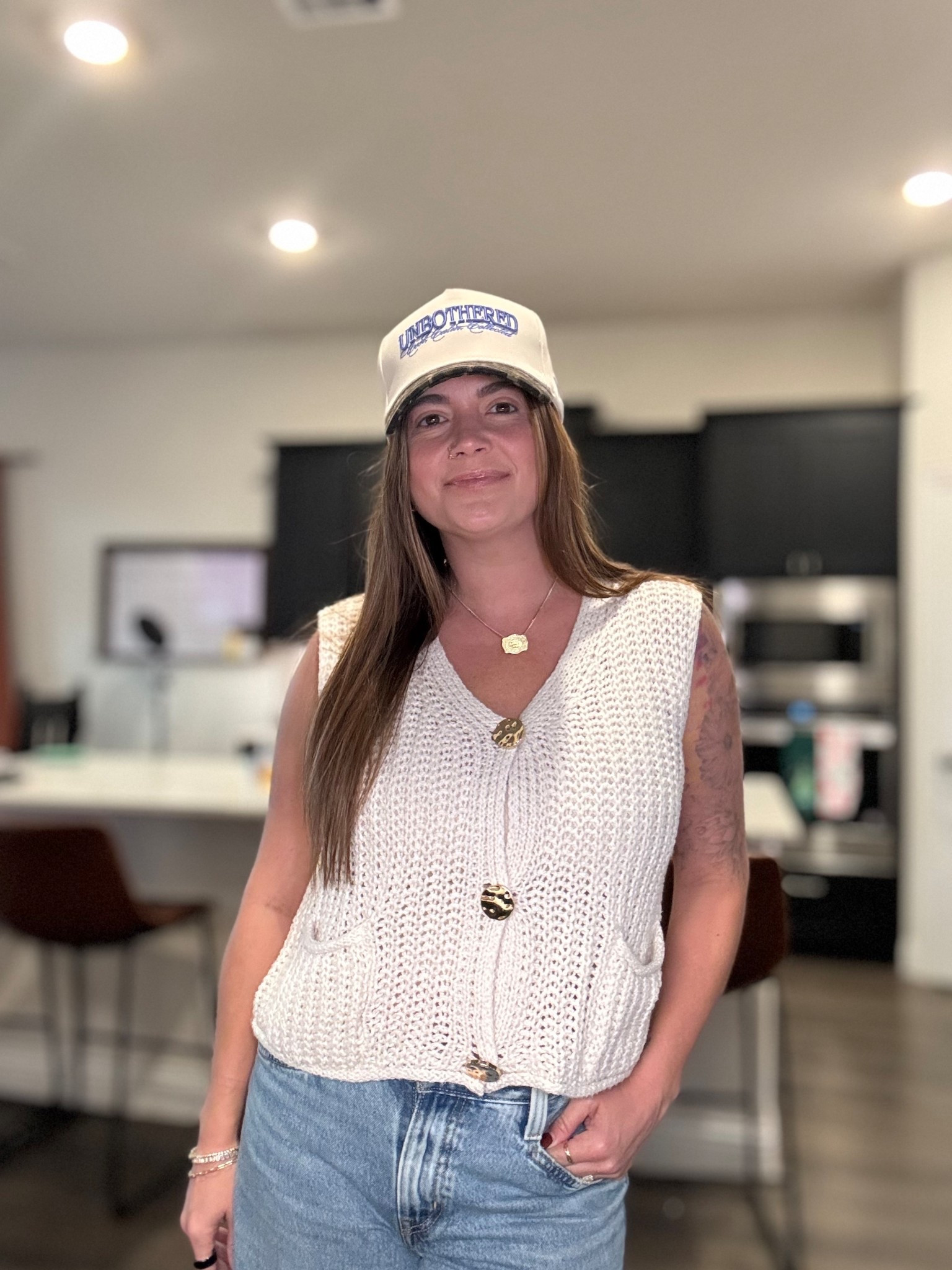 I live in Texas where it’s almost 90 degrees in November. Fall fashion is my absolute favorite though so, of course I need sleeveless sweaters! This specific sweater vest comes in so many colors and it’s so flattering with jeans. Throw on some Levi’s and a KenzKustomz cap and you’ve got an easy, Fall in Texas, Mom approved fit. #ootd #momfit #momlife #texas 

#LTKmomlife #LTKootd #LTKFindsUnder50