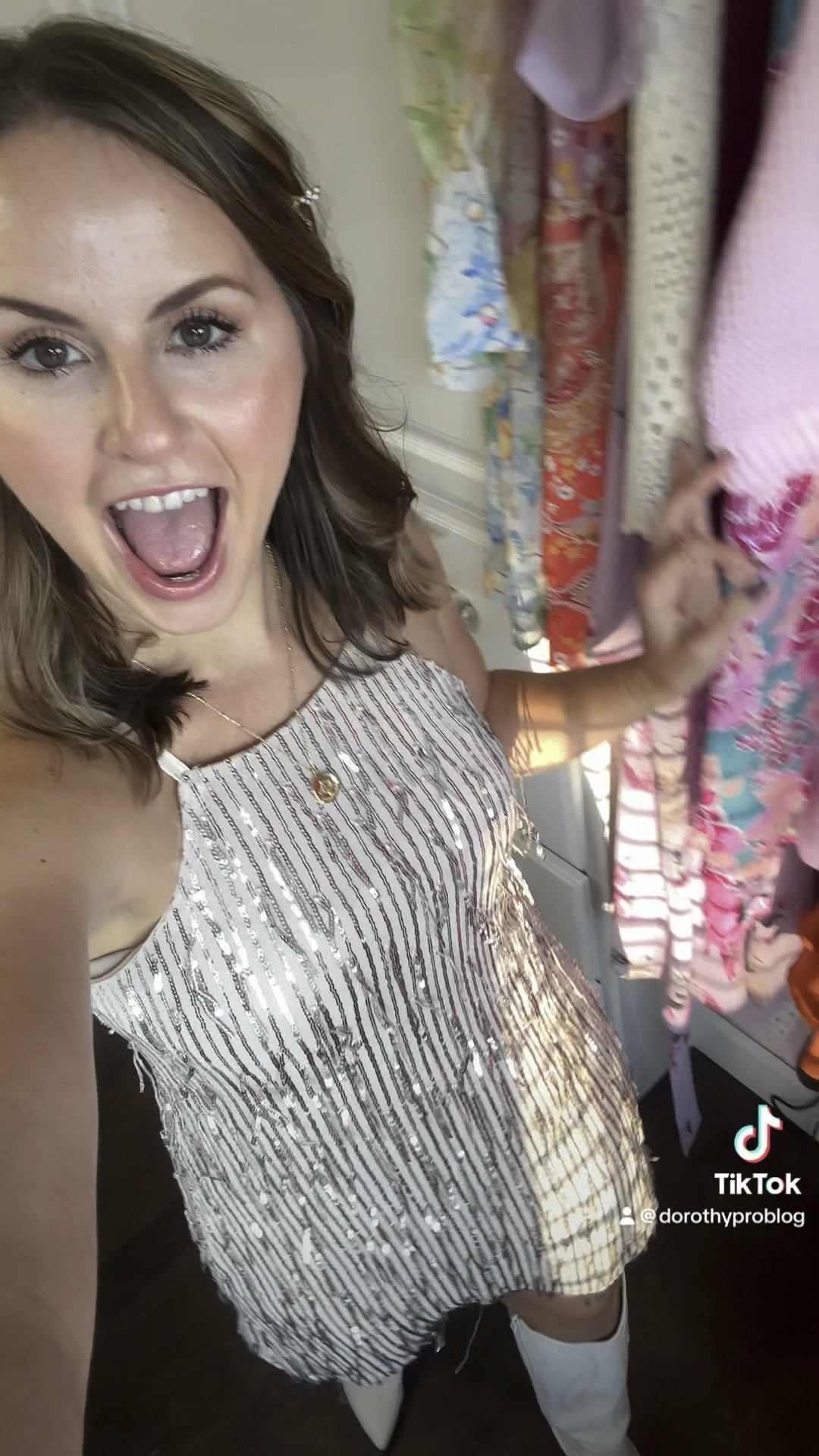 Get ready with me for the Meghan Trainor concert! 

this sparkly halter shift dress is great quality and super affordable. This would be perfect for the errors tour, Sabrina Carpenter concert, Taylor, Swift, concert, Vegas trip, or Nashville outfit. 

Hair tip: Anyone else have to put their hair in curly qs so that it will stay curled? They have very fine hair does not like to stay curled— but this 3/4 inch curling iron with a long barrel helps a ton. Linking my thickening spray and curling iron that helps my hair stay curled. I make sure to let it cool to room temperature before brushing through it.

Rhinestone dress, sequins fringe dress, concert outfit, white cowgirl, boots, cowboy boots, Lainey Wilson, concert, short and sweet tour

#LTKParties #LTKStyleTip #LTKVideo