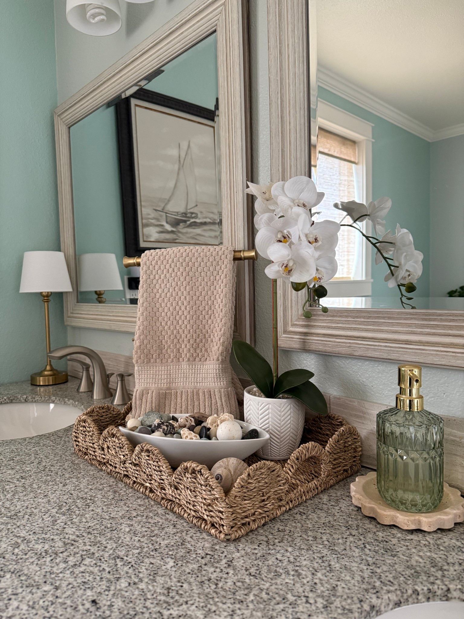 Coastal cottagecore bathroom refresh 🌊
Soft blues, warm neutrals, natural textures, and vintage-inspired details come together in this coastal chic bathroom refresh. A light, airy take on cottagecore with relaxed seaside charm—perfect for anyone who loves coastal home decor, timeless bathroom styling, and calm, collected spaces that feel both fresh and lived-in. 

#LTKSeasonal #LTKHome #LTKdayinmylife