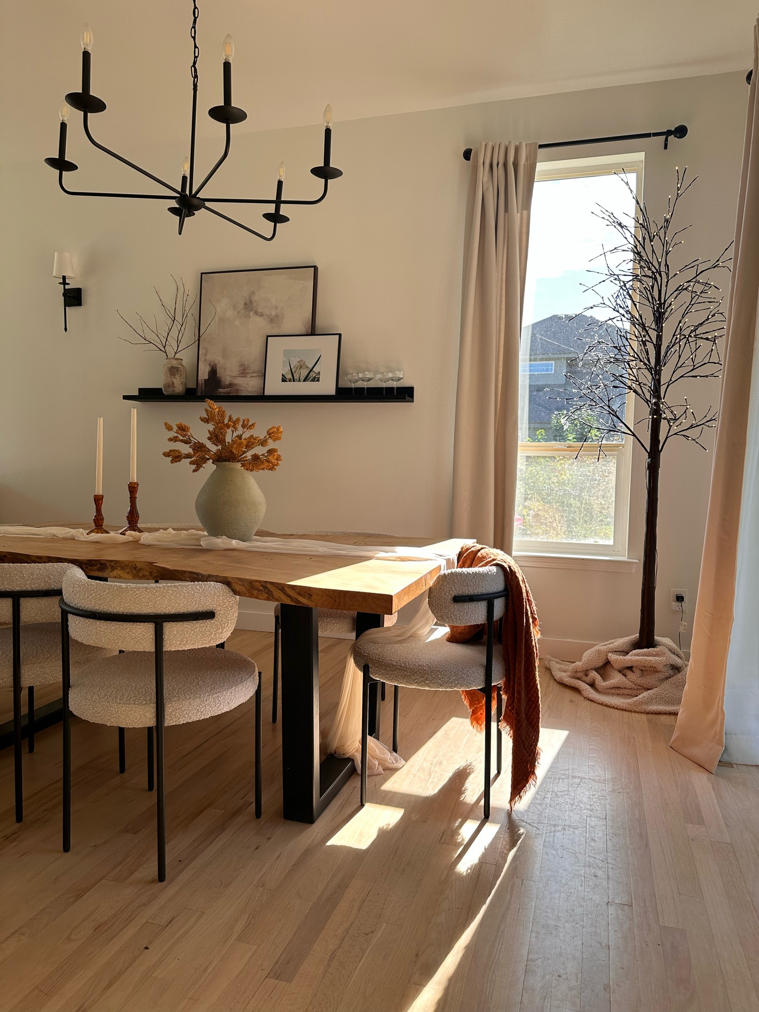 Fall dining room fall decor twinkle tree, live edge table, table setting, fall table setting, thanksgiving setting, black chandelier, chandelier, large chandelier 