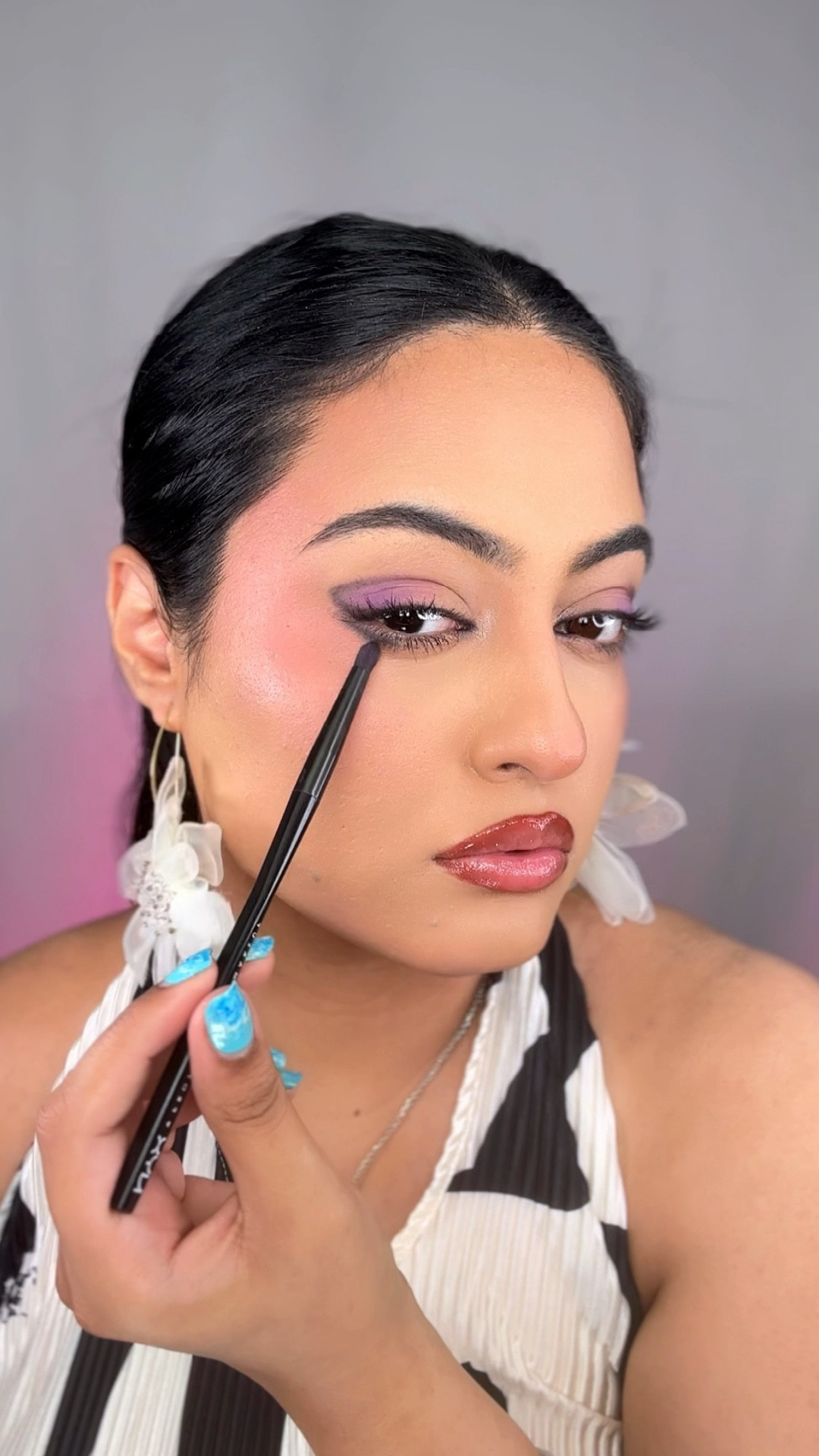 Colourful eyeshadow and makeup for summer, purple eyeshadow, dewy makeup 

#LTKbeauty #LTKVideo