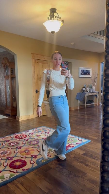 Wide leg jeans, cozy sweater and some Nikes for this cool spring day! Loving the fit of these jeans. Paired with my new Dior floral strap and white Dior bag. Wearing size small in sweater. Size 25 in jeans. Size 7.5 in sneakers. 

#LTKstyletip #LTKover40 #LTKSeasonal