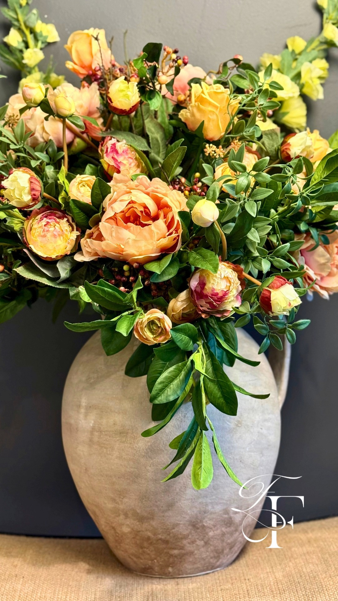 These berry branches are really the star of this faux arrangement. I mixed them with faux yellow peonies, roses, and ranunculus, plus some apple blossom stems, and dropped everything into this Pottery Barn ceramic vase. The inspo came from a cute little horse picture with burgundy and yellow tones and lots of green in the background. It all just came together perfectly, and I’m kinda obsessed with spring faux flowers ✨

 #LTKdecor #LTKfinds #LTKstyling #HomeDecor #FauxFlorals #FauxFlowers #SpringDecor
 

 #LTKHome