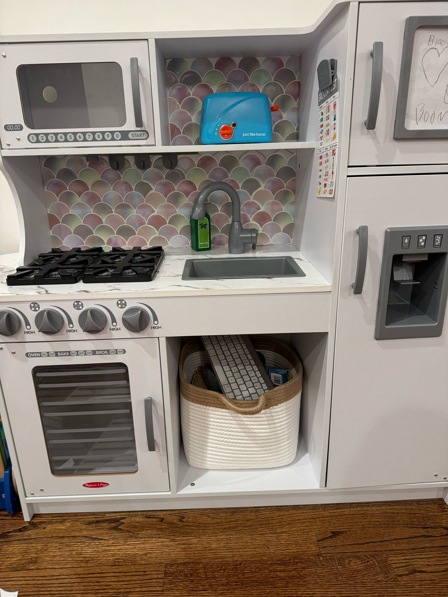 Play kitchen and I added the sticky back splash tile to make it more fun 🤩 