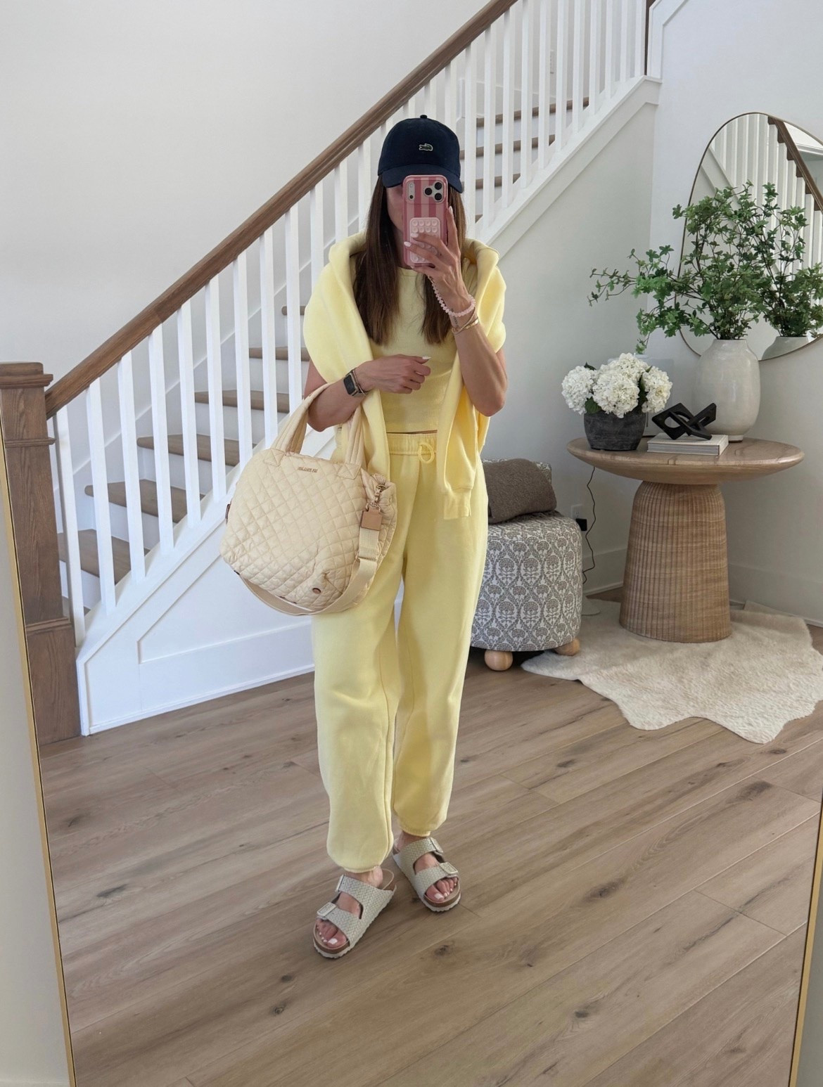 This butter yellow lounge set is such a good travel and everyday outfit. The soft matching set paired with neutral slides, a baseball hat, and a cozy sweater over the shoulders gives that effortless elevated casual look everyone is loving right now.

Size  S

Matching lounge set, butter yellow outfit, casual chic style, travel outfit, airport outfit, cozy matching set, neutral sandals, baseball hat outfit, elevated athleisure, comfy everyday outfit, spring lounge wear, annabrstyle

#LTKSeasonal #LTKOver40 #LTKTravel