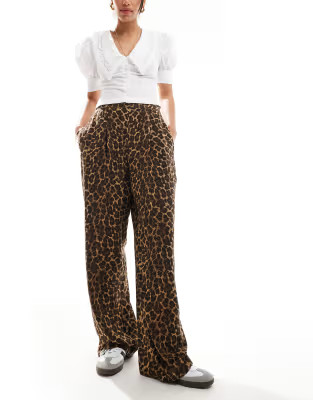 ASOS DESIGN relaxed pull on pants in animal print | ASOS (Global)