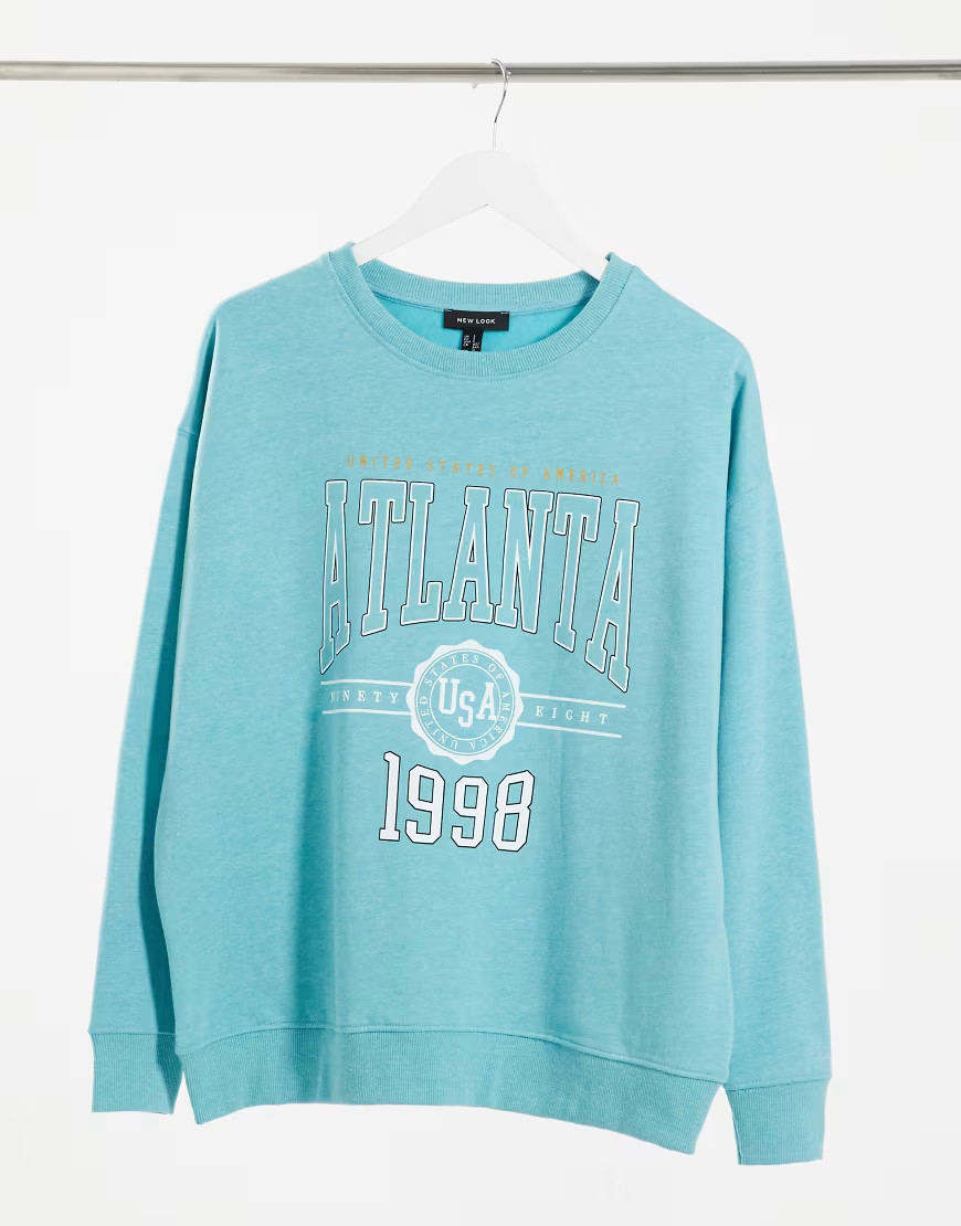 New Look oversized Atlanta slogan sweatshirt in bright blue-Green | ASOS (Global)
