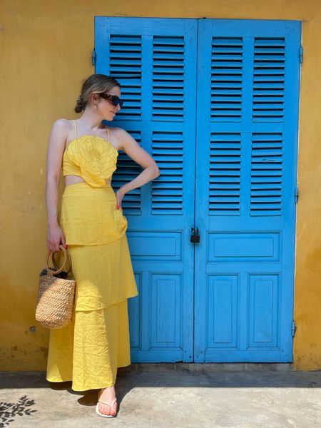 one of my favorite dresses I wore in Vietnam was this linen layered dress with a floral design. The yellow color is so vibrant- so it looks great in pictures!! I’m wearing a size small. #vietnam #vietnamoutfits #summerdress #colorfuldress #yellowdress #floral 

#LTKstyletip #LTKSeasonal #LTKtravel