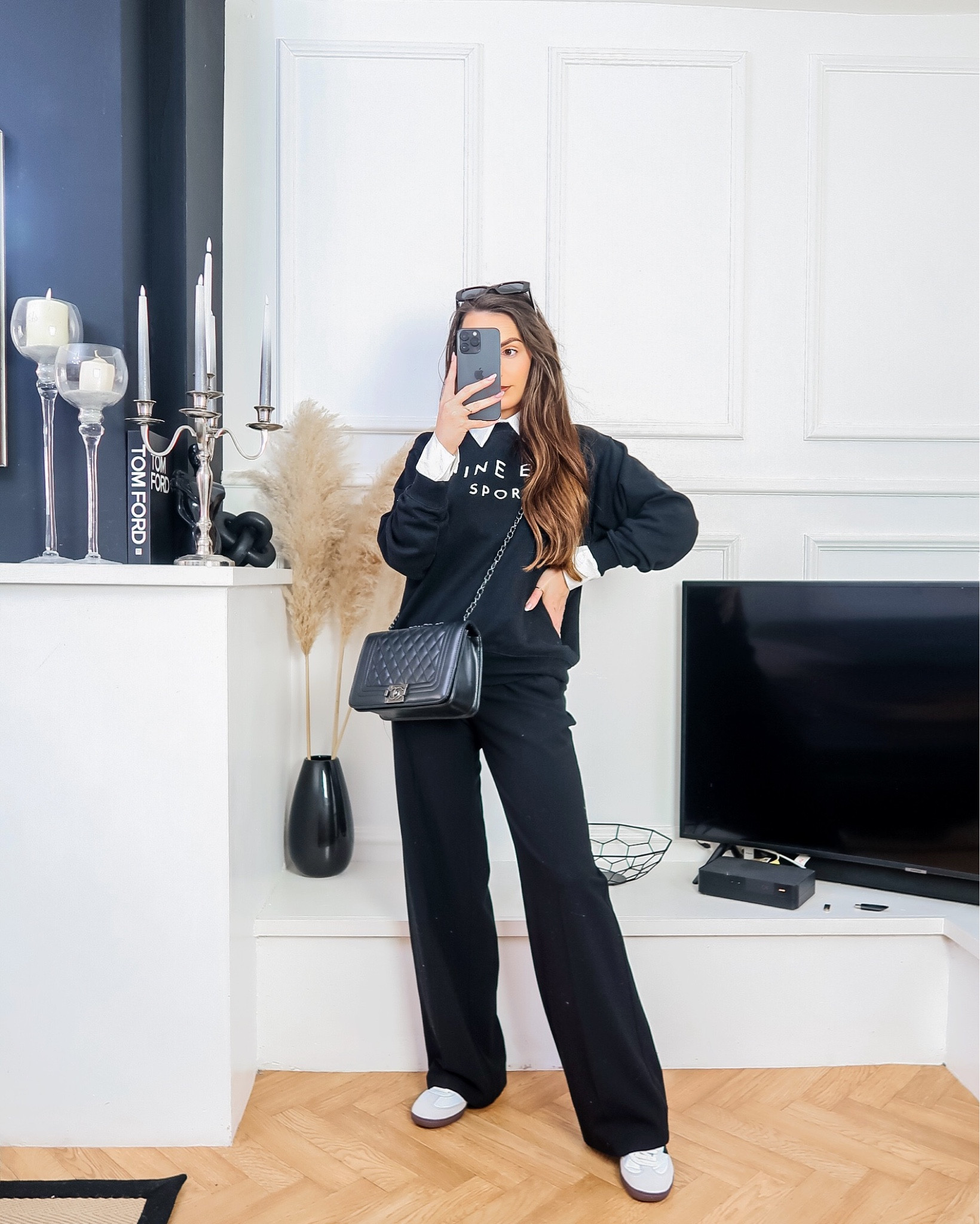 Black and white outfit idea, winter outfit, winter workwear, early spring outfit, February outfit idea, monochrome outfit idea, black tailored trousers, white shirt bodysuit, black anine bing even sport sweatshirt, workwear look, adidas sambas, simple outfit 

#LTKworkwear #LTKstyletip #LTKeurope