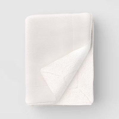 Solid Plush Throw Blanket with Faux Shearling Reverse - Threshold™ | Target