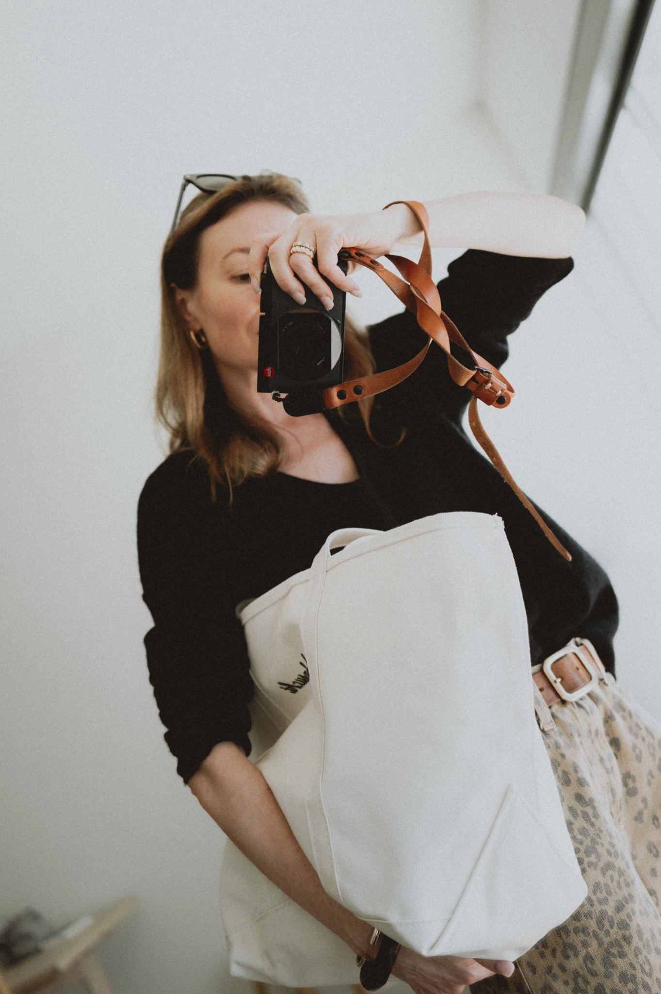 Accessorizing a v-neck cashmere sweater with a rounded square buckle belt + a canvas tote. 

#LTKSeasonal #LTKStyleTip #LTKItBag