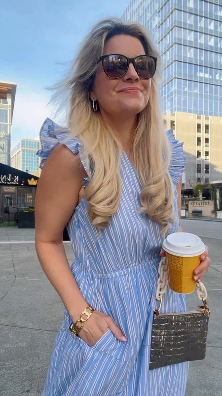 Love blue stripe summer dresses - perfect spring and summer outfit. I also love dresses for a travel outfit / vacation outfit, just so comfy! Also a great wedding guess dress!

#LTKSeasonal #LTKsalealert #LTKfindsunder50