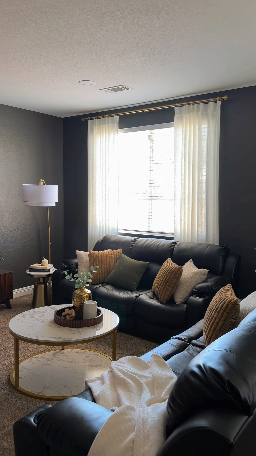 Living room decor, code table, marble, tv stand, wood , curtains, gold rods 