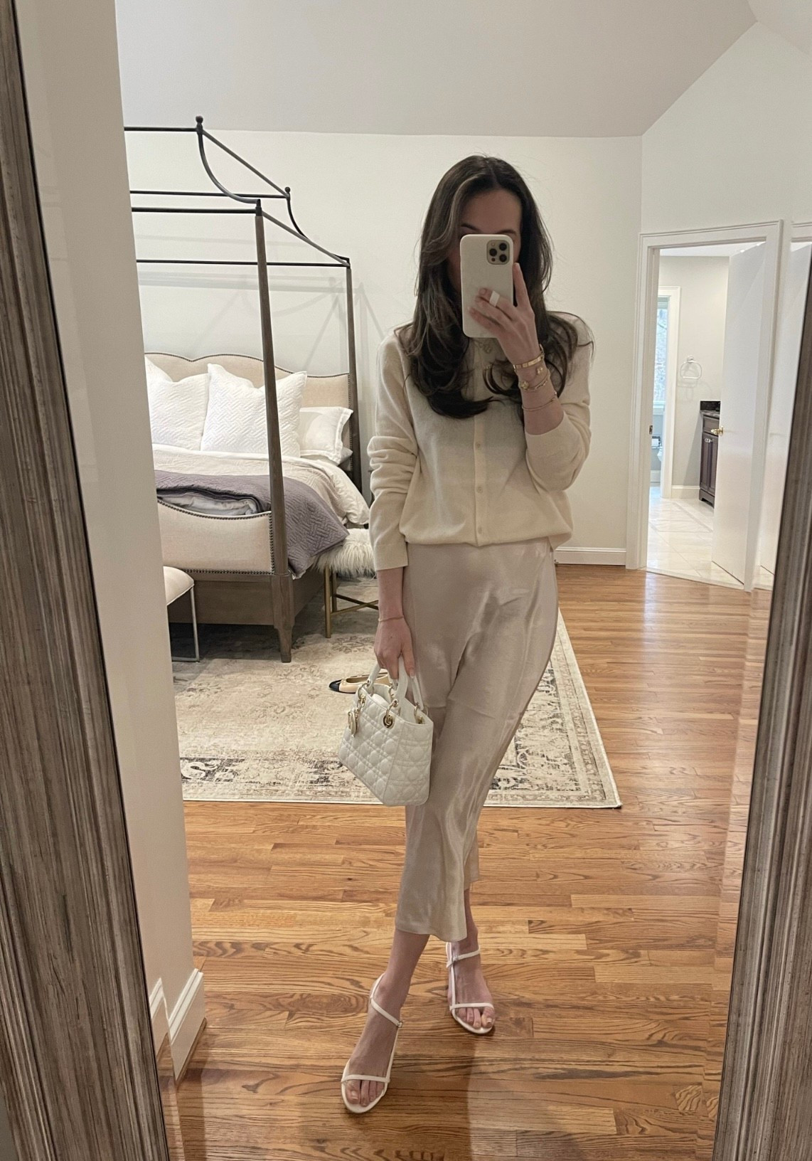 @Aritzia cashmere cardigan + Aritzia satin skirt for Spring 

#LTKootd #LTKSeasonal #LTKOver40