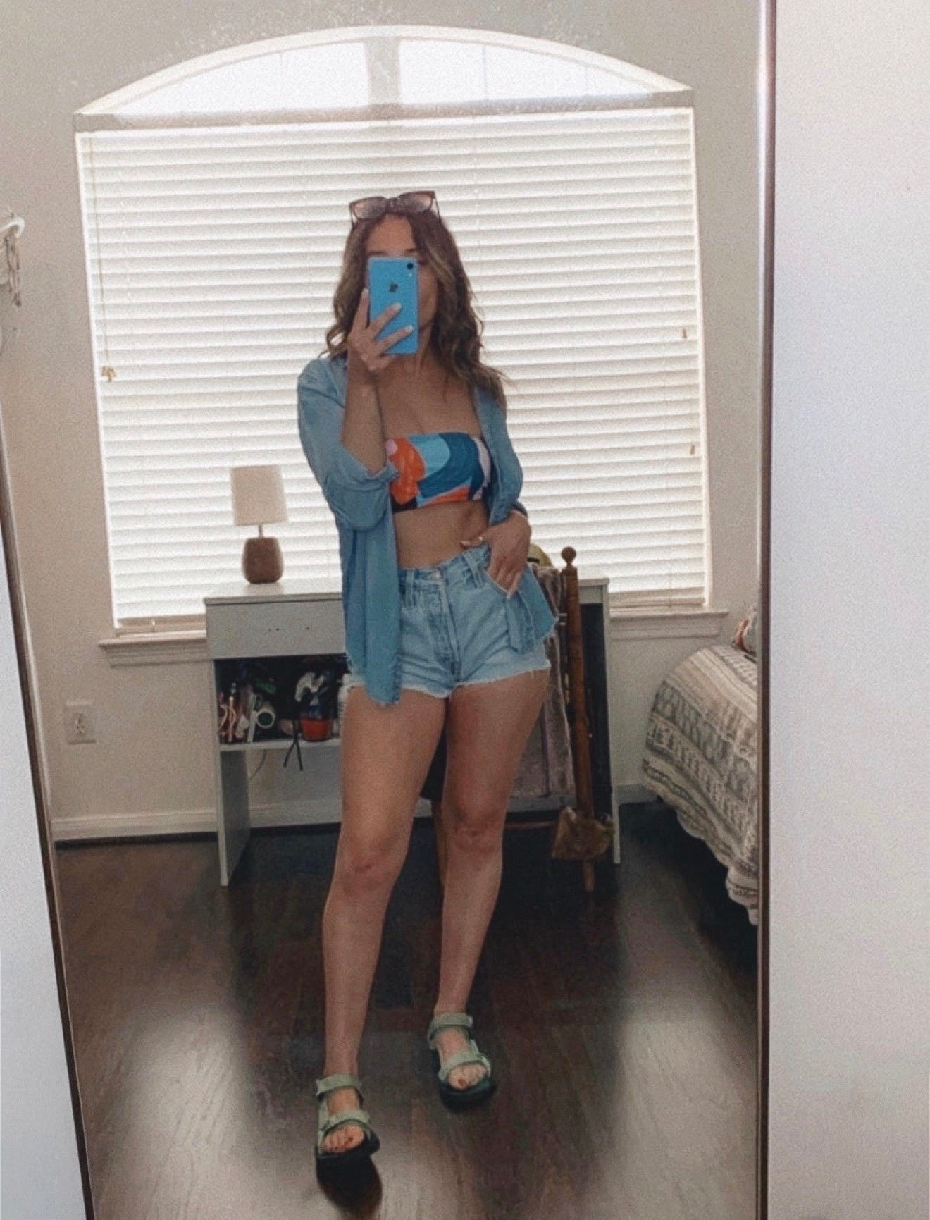 Easy bikini cover up outfit idea! 

Transitioning a colorful strapless bikini top from the pool to a casual lunch by adding high waisted Abercrombie denim shorts and an oversized lightweight button down. Paired with the most comfy waterproof Tevas for an effortless look. 

Everything fits true to size!
Button down: XS
Swim Top: S
Swim Bottoms: S
Shorts: 0

#LTKxAbercrombie #LTKootd #LTKPetite