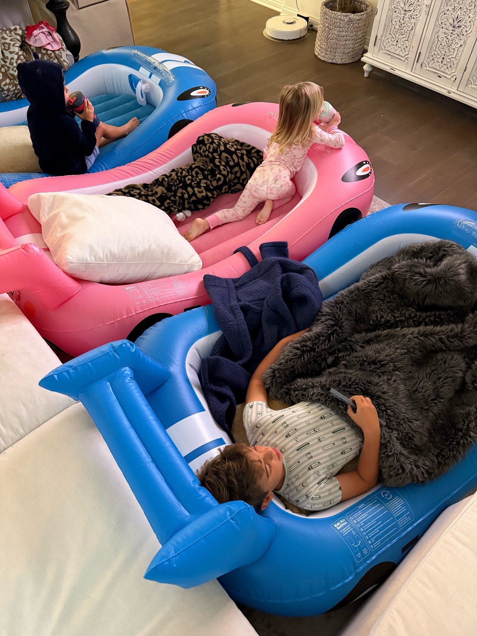 Movie + race car beds for this rainy day 🌧️ I bought these beds around Christmas last year and my kids love them! They’re fun for sleepovers, movie nights or just for fun 🏎️

Amazon, kids blow up beds, inflatable beds, sleepover beds, racecar beds, movie nights beds