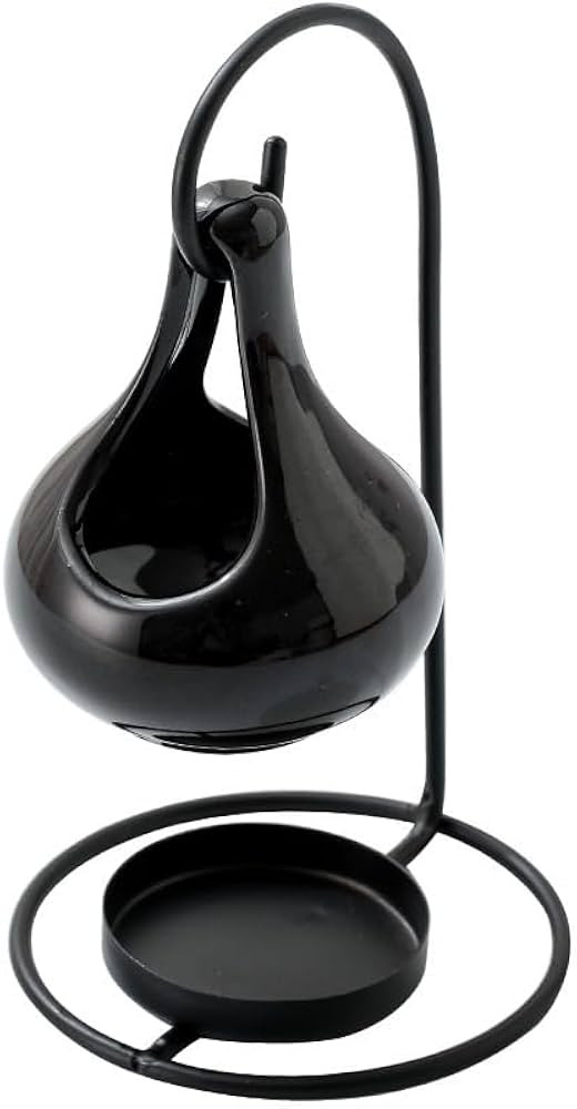Amazon.com: Modern Minimalist Candle Holder, Sturdy Iron Candlestick with Rounded Black Finish, T... | Amazon (US)