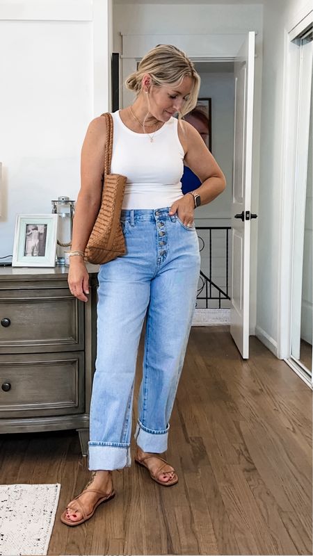 DENIM SALE!! Best bra friendly tank! Stretchy and so flattering. Ruched sides and I’m in a small  so if in between, size down. Jeans run tts and the regular length is perfect is you’re inseam is 29". I just love them cuffed! 

#LTKMidsize #LTKFindsUnder50 #LTKStyleTip

#LTKSaleAlert #LTKSummerSales #LTKFindsUnder50