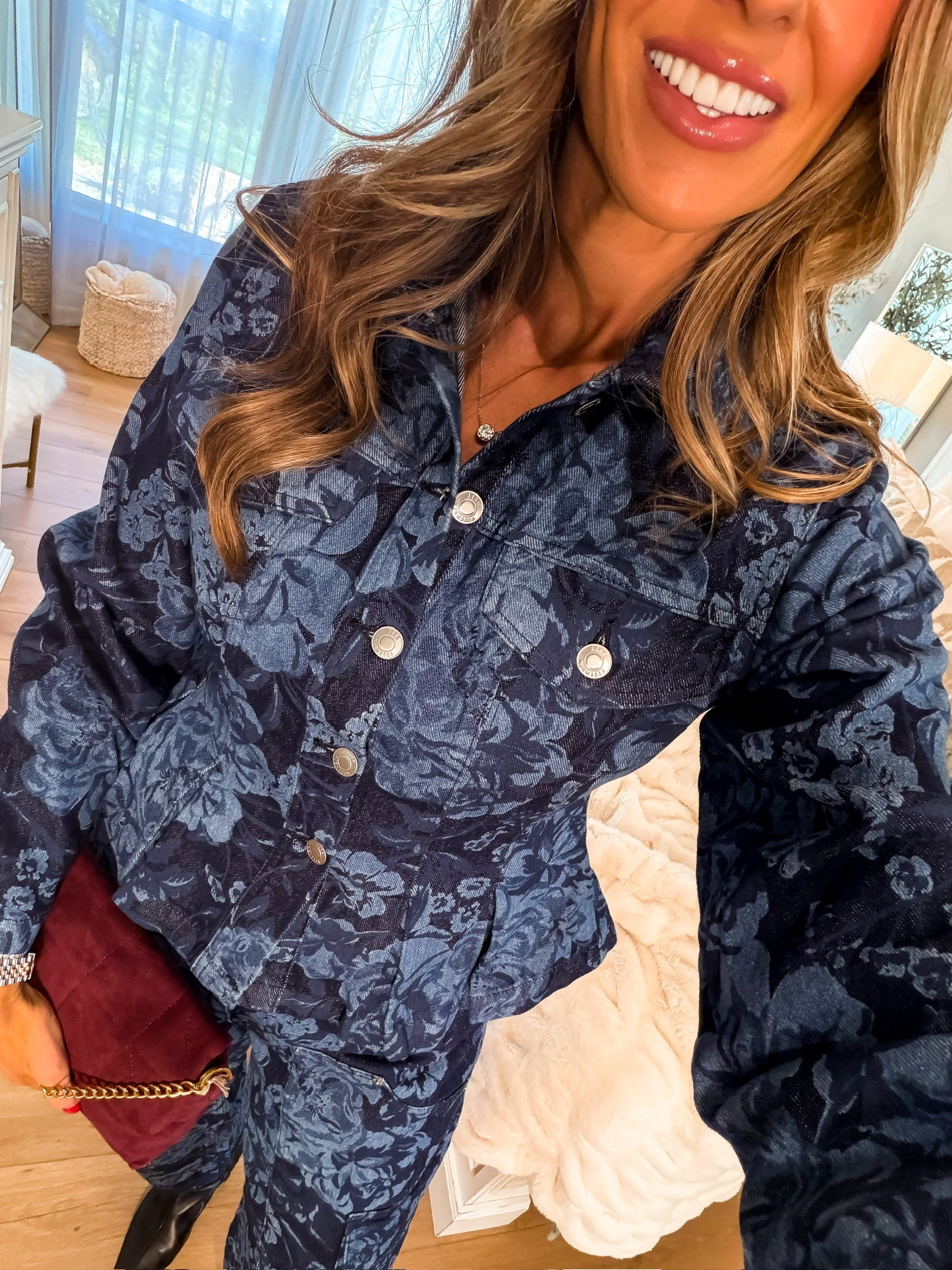 This navy floral set makes fall dressing so easy. The matching top and pants give you a complete look in seconds, while the darker floral print feels seasonal and still stands out from the usual fall neutrals.

navy floral set, fall matching set, floral two piece set, printed pants set, fall outfit ideas, women over 40 style, casual fall fashion, statement fall outfit, everyday fall style, TheMomInStyle