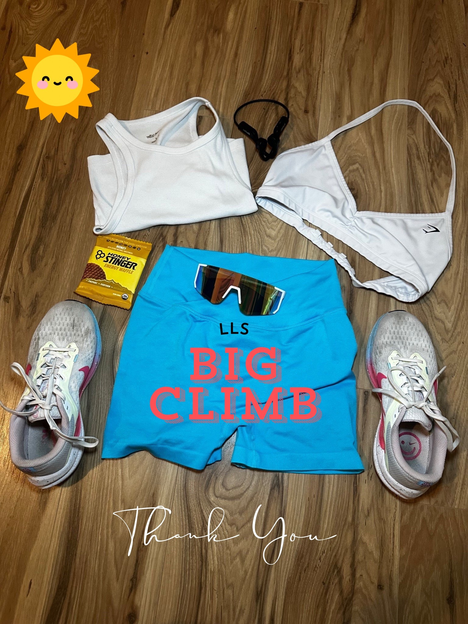LLS Big Climb SF flatly 

Runner flat lay 
White ribbed crop top 
White halter sports bra 
Blue crossover cinched back 
Shatterproof sports sunglasses 
Nike running shoes 
Shokz open ego headphones 
Honey Stinger energy waffle


#LTKActive