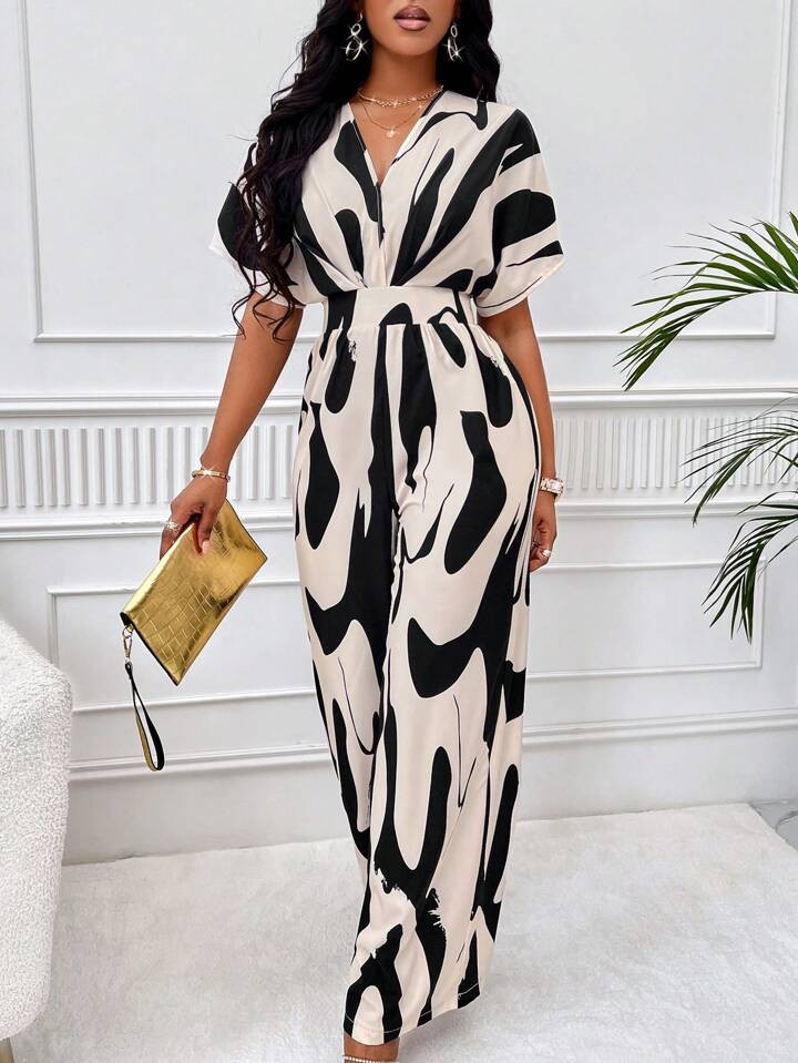 SHEIN Slayr Allover Print Batwing Sleeve Belted Jumpsuit | SHEIN