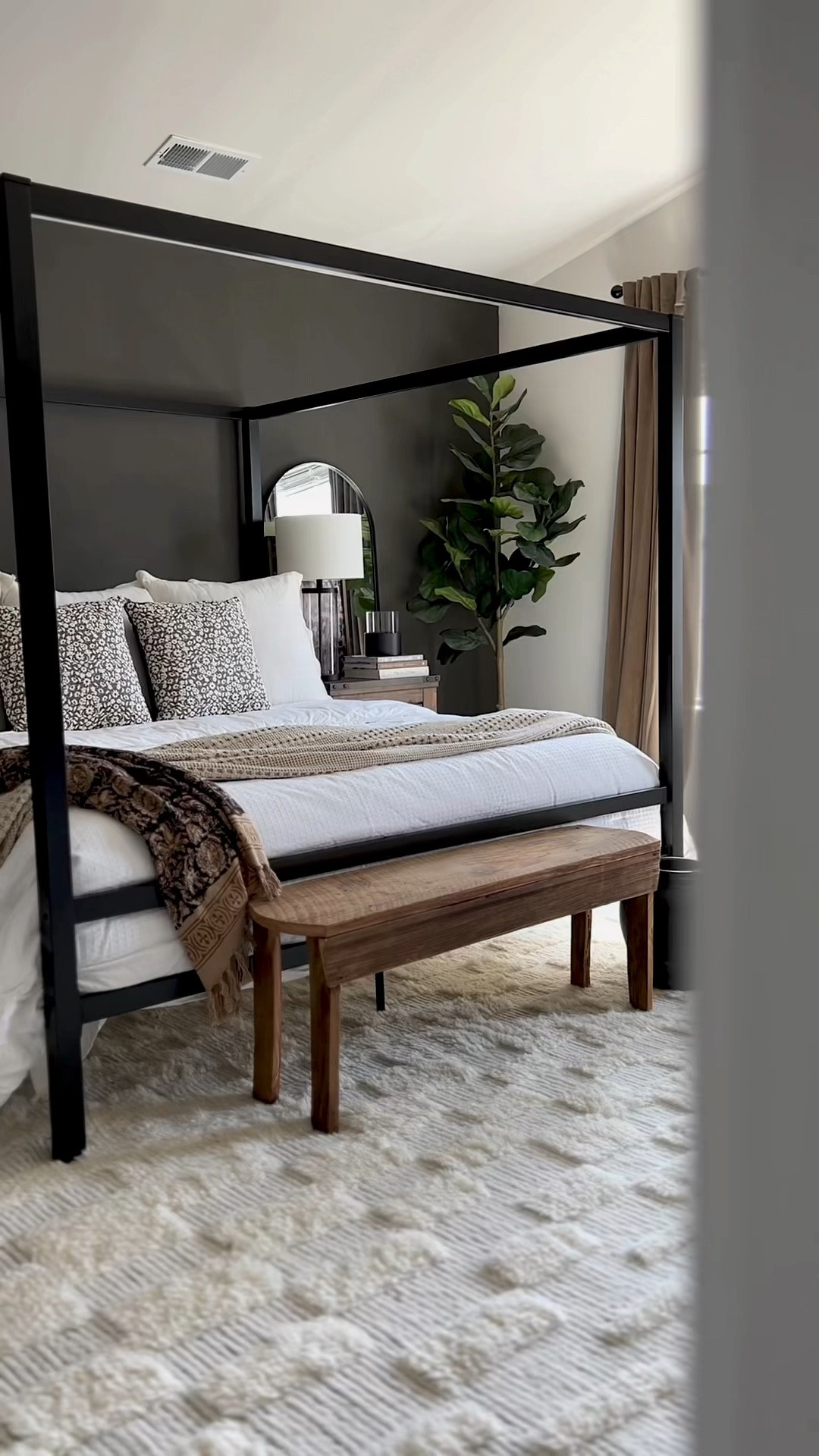 Budget friendly modern bedroom design!
Canopy bed, rustic nightstand, nightstand under $200, waffle weave blanket, velvet curtains, arch mirror, indoor firepit, faux fiddle leaf, glass table lamp, black canopy bed, Walmart decor, Amazon home decor

#LTKVideo #LTKHome #LTKSaleAlert