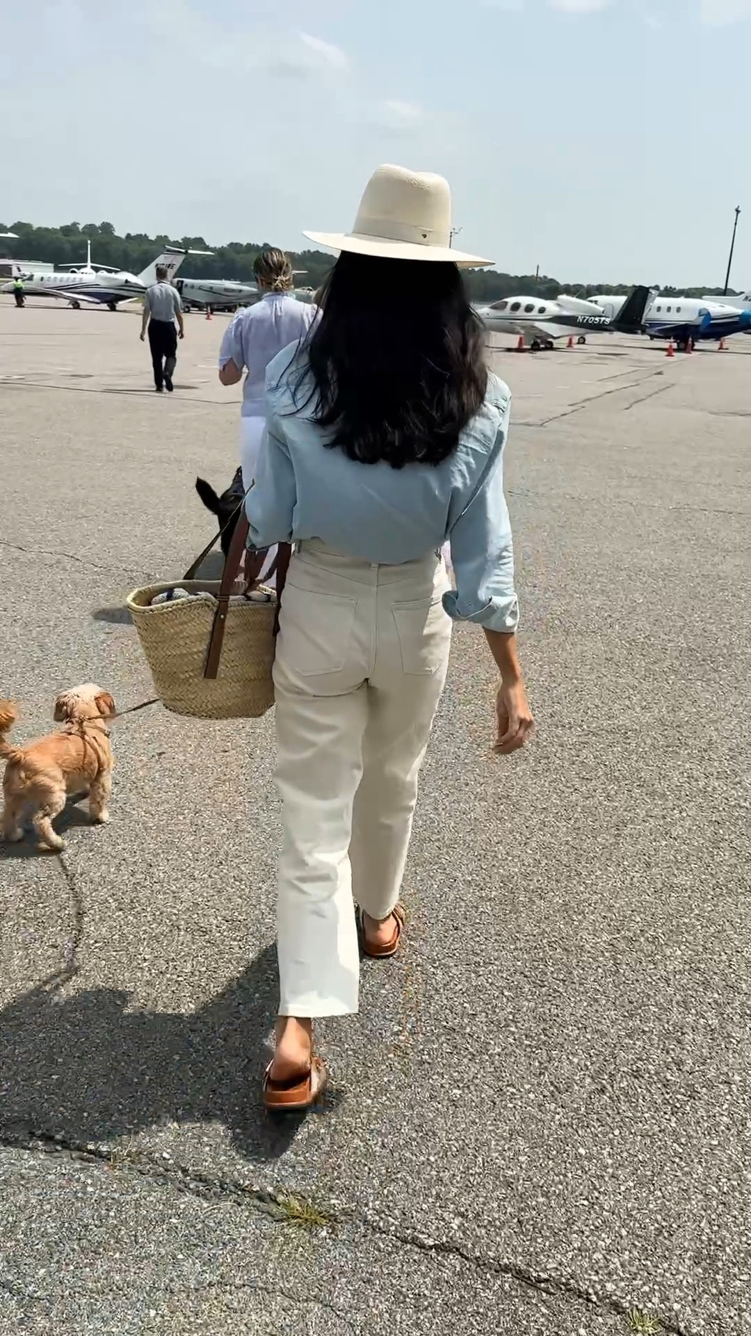 Best ivory denim jeans for fall! Travel outfit, bone jeans, cream jeans, Fendi sandals, chambray shirt, dog leash. 

I took my normal size in the jeans! 

#LTKSeasonal #LTKTravel #LTKPets