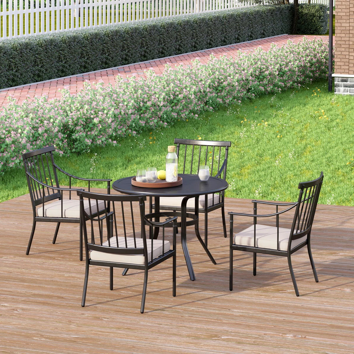 Argyri 4 - Person Patio Dining Set with Round Table , Cushions Included | Wayfair North America