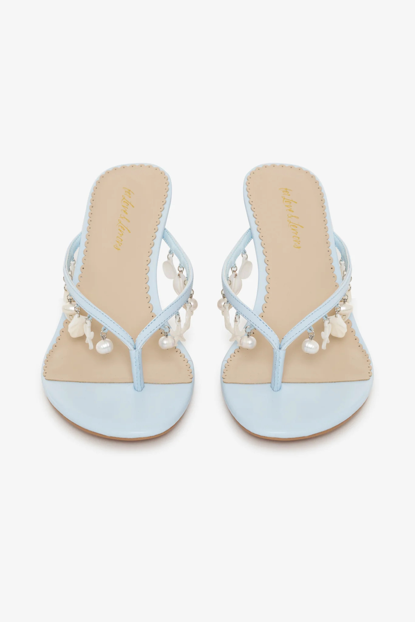 Sailor Charm Thong Heel$249 BlueBlack Blue Select a sizeThese blue leather heeled thong sandals h... | For Love & Lemons