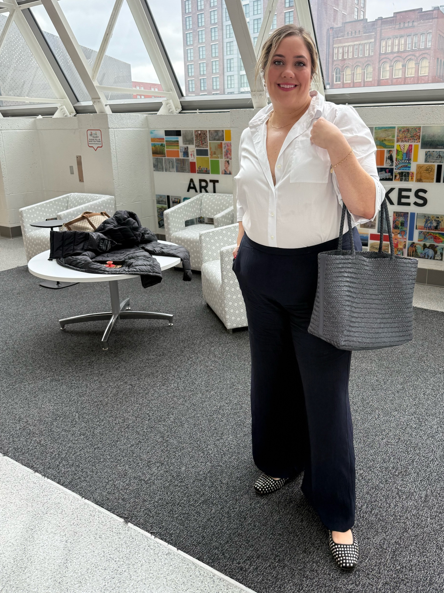 Work outfit. 

White shirt is Madewell, but not available in white anymore. I have it in two prints and LOVE it. It doesn't wrinkle as easily as other shirts and almost feels like sateen sheets. But the best part is that it buttons to elbow. But not in a "I love to hike" kind of way. In like a classy tux cuff kind of way. I don't know what I'm saying. You can see what I mean. They're like pressed. 

Love the pants. They're J Crew and perfect length for me. I'm apple shaped and 5'10 but have a shorter I seam. 

Still love these shoes. They break in and become one with your foot. I forget I'm even wearing them sometimes. 

The bag is Madewell and I love it. It's no frills. Literally just a hollow space surrounded by woven leather. And it's kind of a a rougher woven leather. But great for the price. I just use bags in bags and a laptop sleeve when carrying it around. And the drop is long enough for my flappers. 



#LTKWorkwear #LTKSpringSale #LTKStyleTip